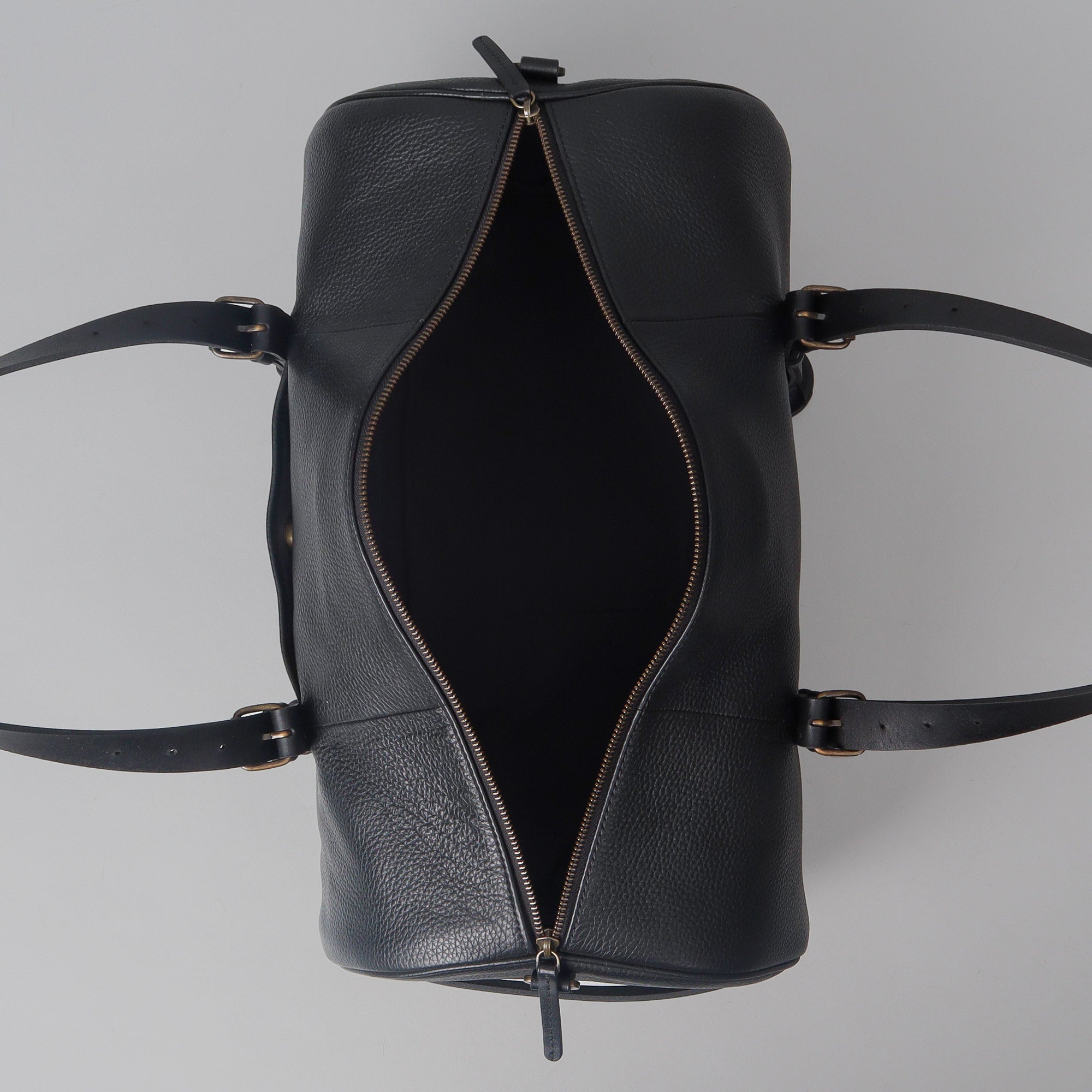 Miami Leather Gym Bag showcasing premium full grain leather, spacious design, and antique brass hardware.