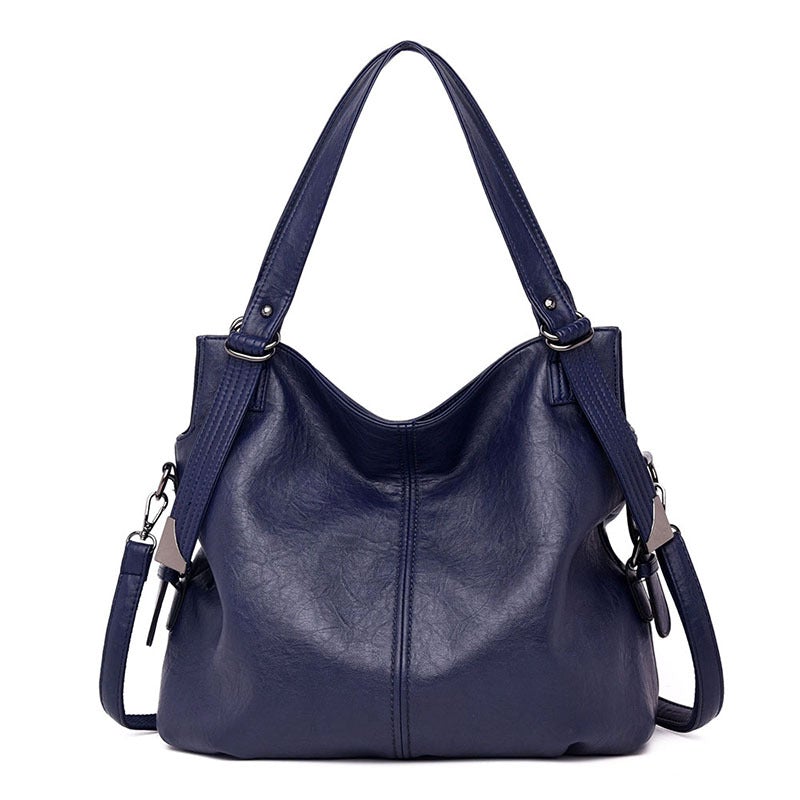 A stylish middle-aged women's vintage PU leather messenger bag in a square shape, featuring a soft handle and a plain pattern, ideal for everyday use.