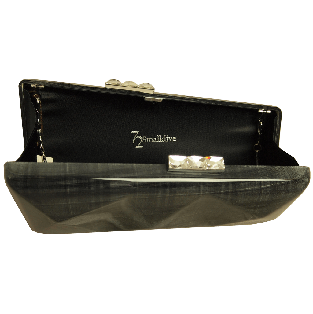 Minaudière in Ash Glen Plaid featuring hard glass acrylic and Swarovski Elements clasp, showcasing a chic and elegant design.