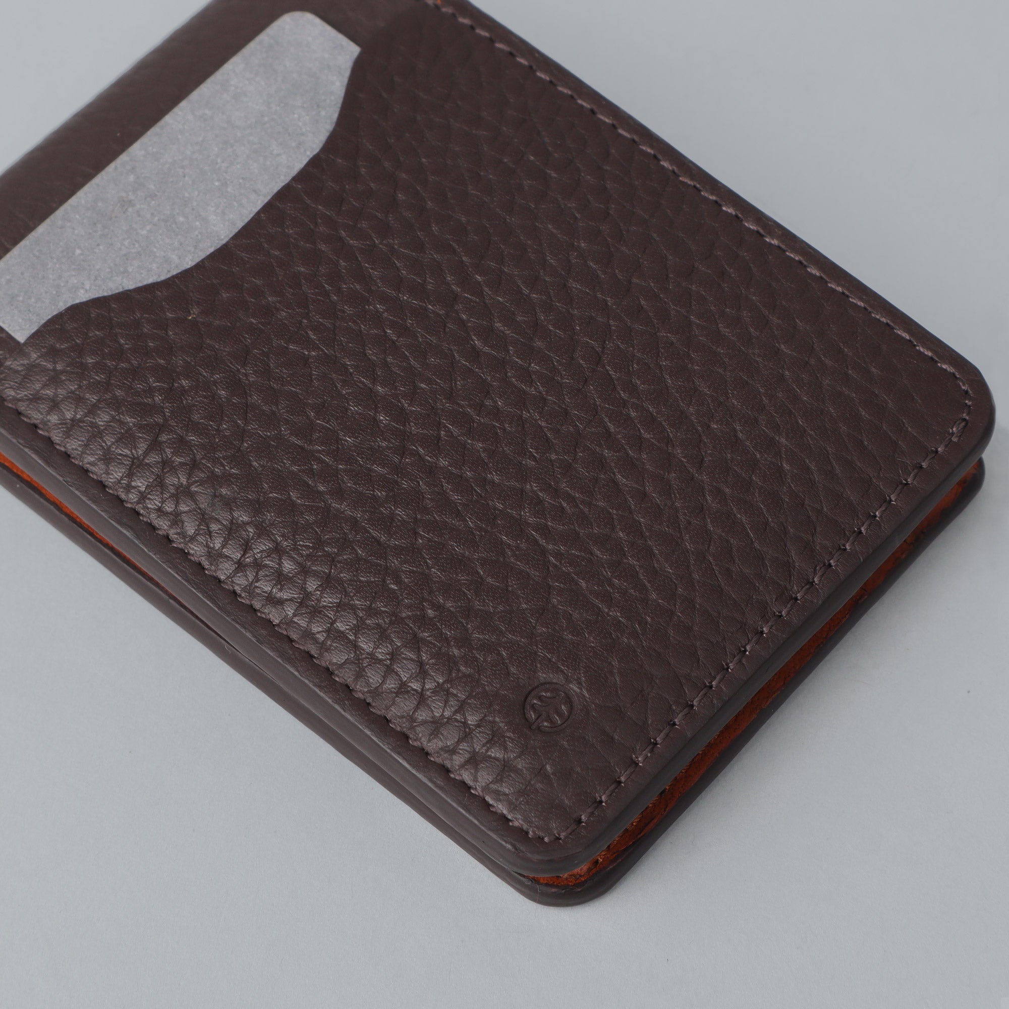 A sleek Minimal Wallet made of premium genuine leather, featuring multiple card pockets and a compact design, ideal for everyday use.