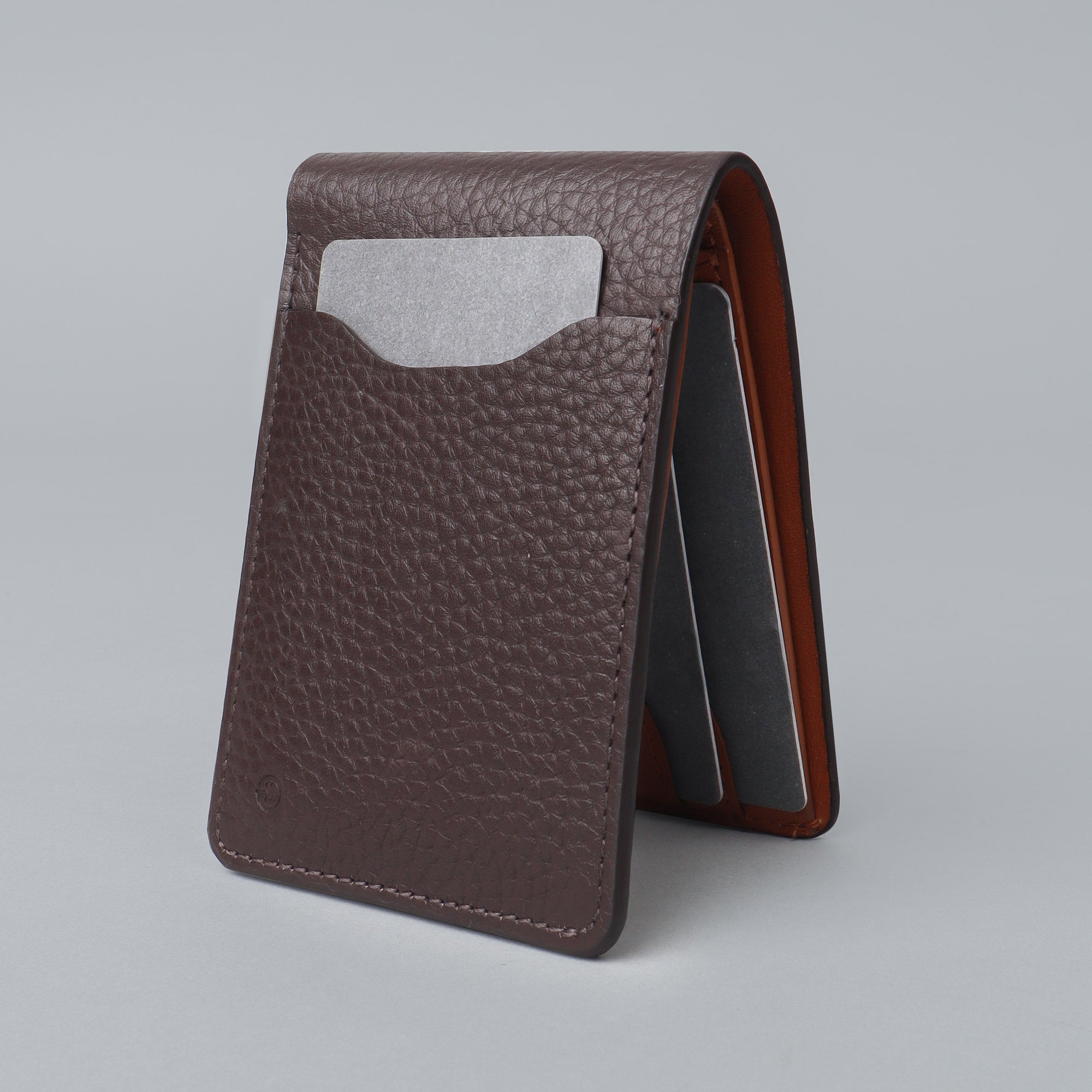 A sleek Minimal Wallet made of premium genuine leather, featuring multiple card pockets and a compact design, ideal for everyday use.