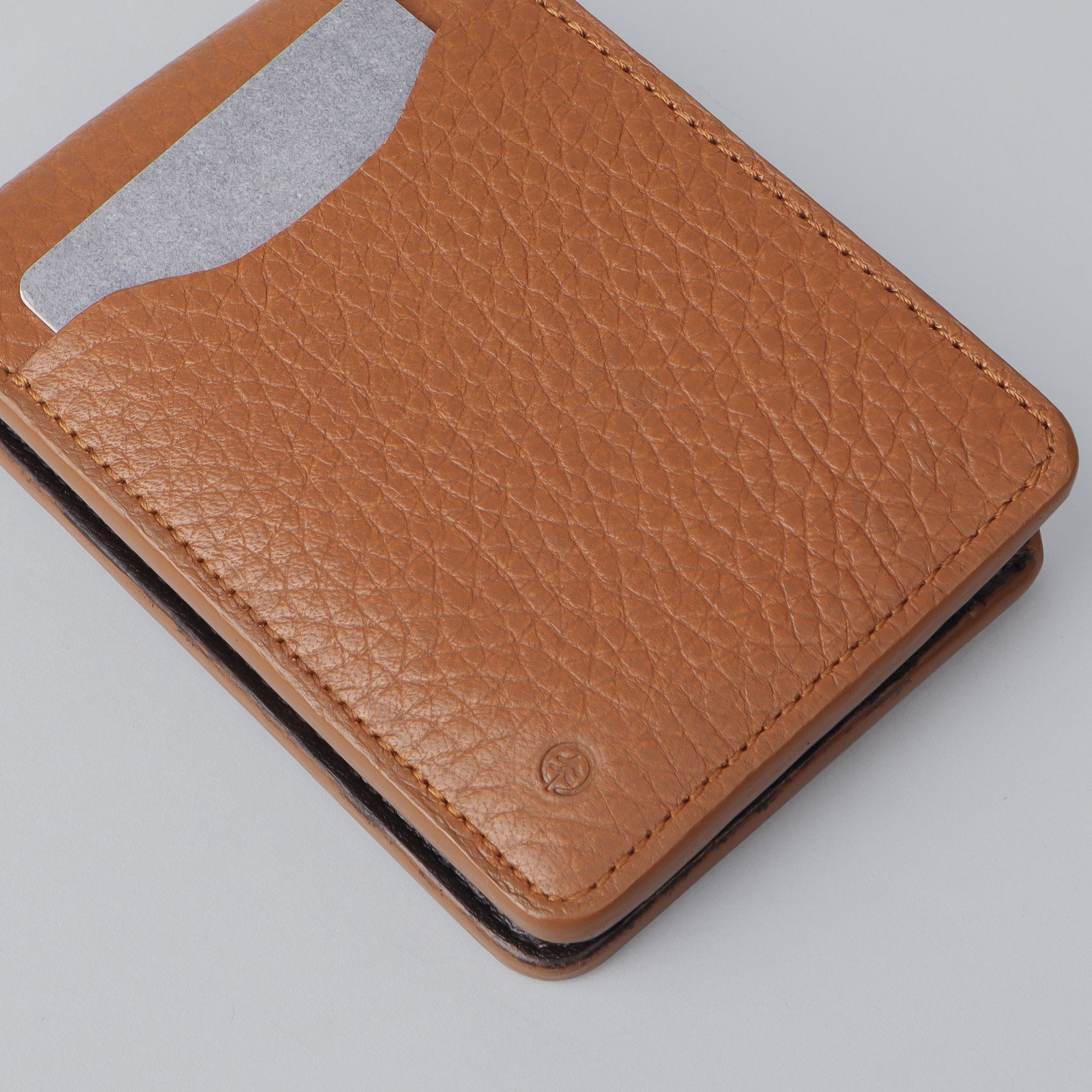 A sleek Minimal Wallet made of premium genuine leather, featuring multiple card pockets and a compact design.