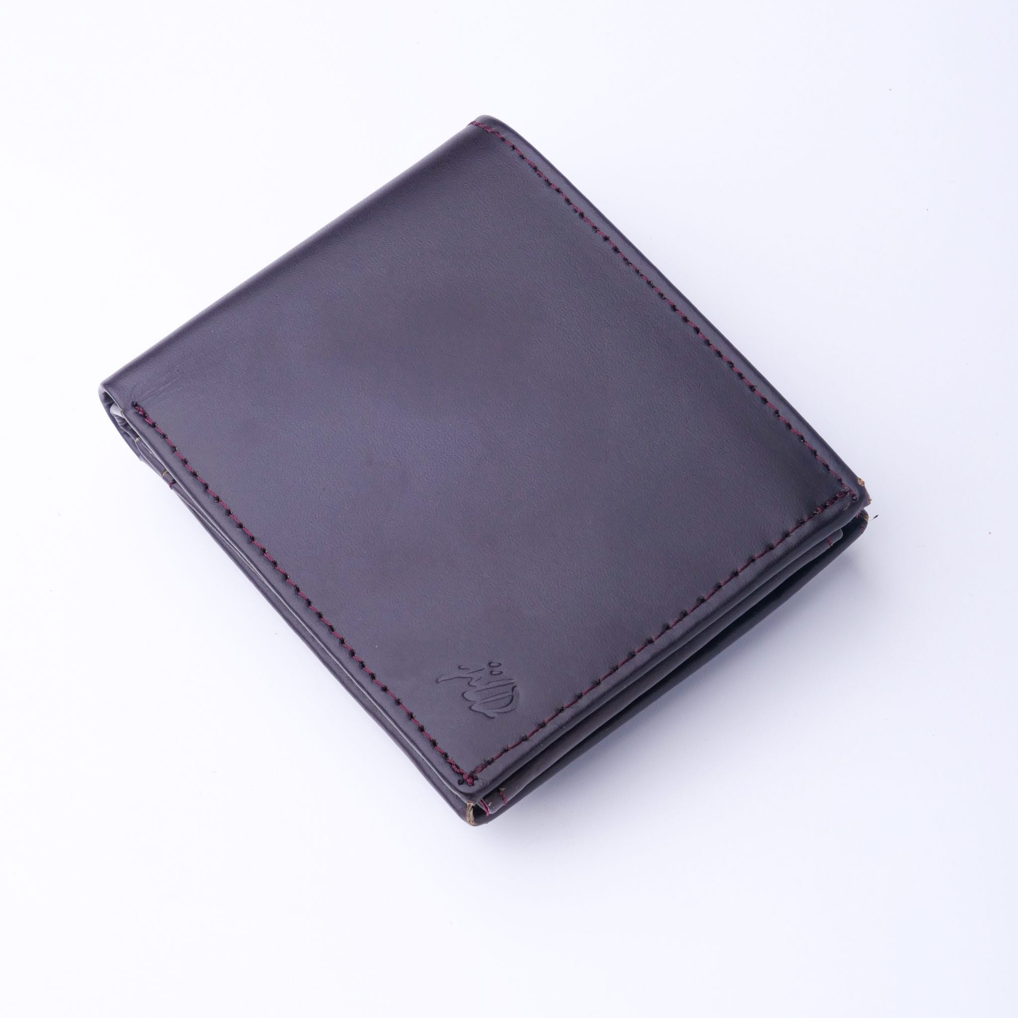 A sleek Minimalist Men's Leather Bi-Fold Wallet showcasing its pure leather finish and multiple card slots.