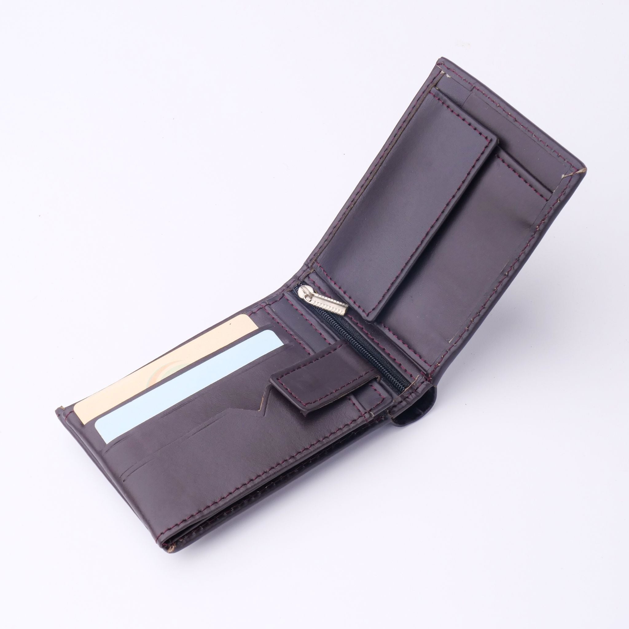 A sleek Minimalist Men's Leather Bi-Fold Wallet showcasing its pure leather finish and multiple card slots.