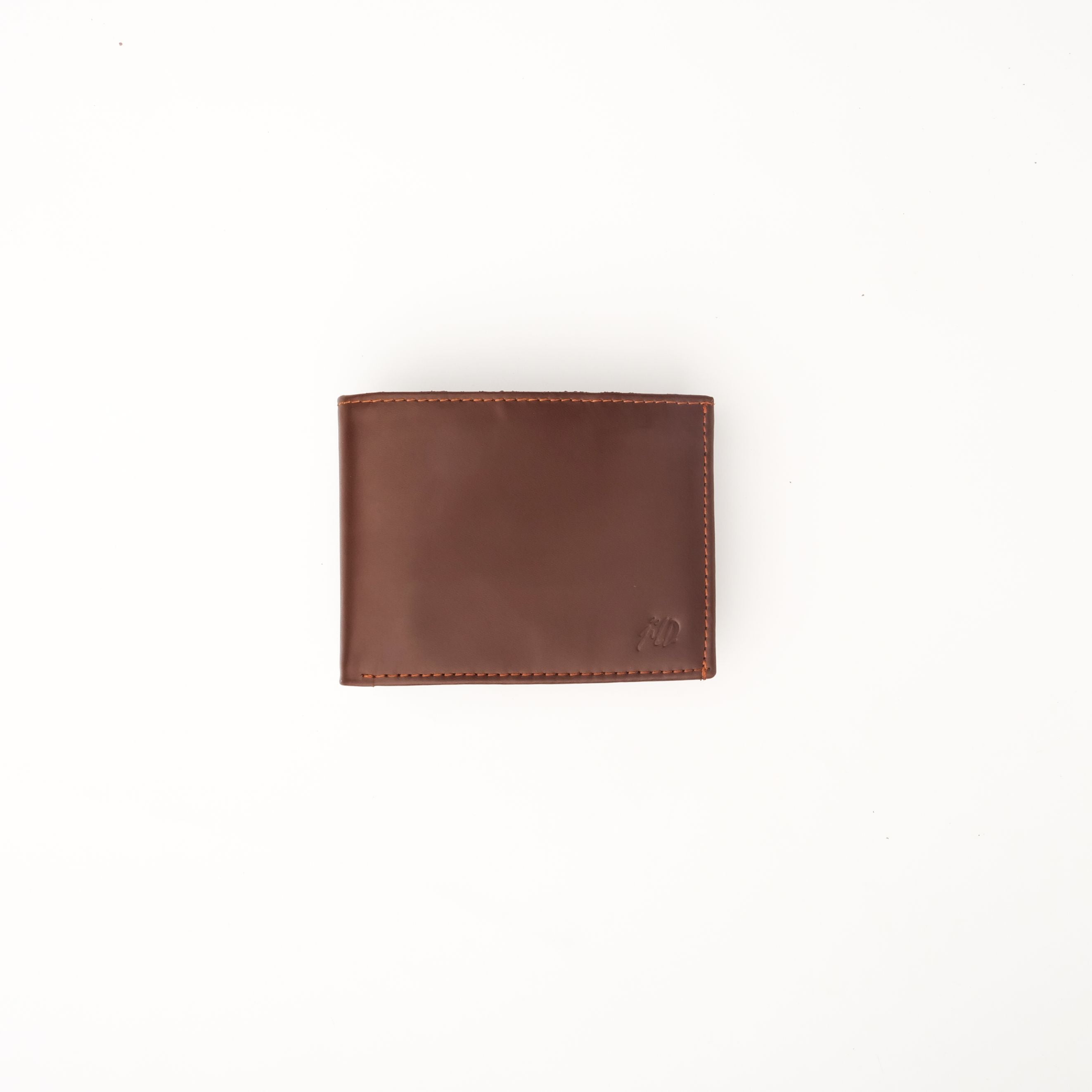 A sleek Minimalist Men's Leather Bi-Fold Wallet showcasing its pure leather finish and multiple card slots.