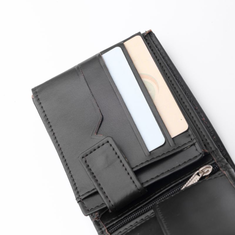 A sleek Minimalist Men's Leather Bi-Fold Wallet showcasing its pure leather finish and multiple card slots.