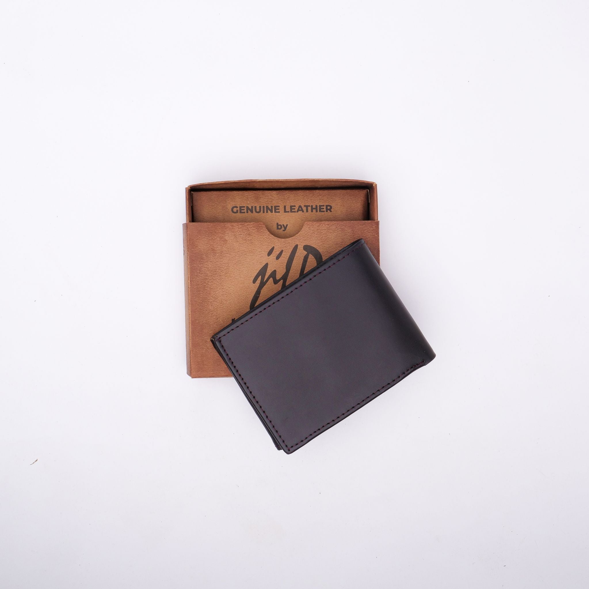 A sleek Minimalist Men's Leather Bi-Fold Wallet showcasing its pure leather finish and multiple card slots.