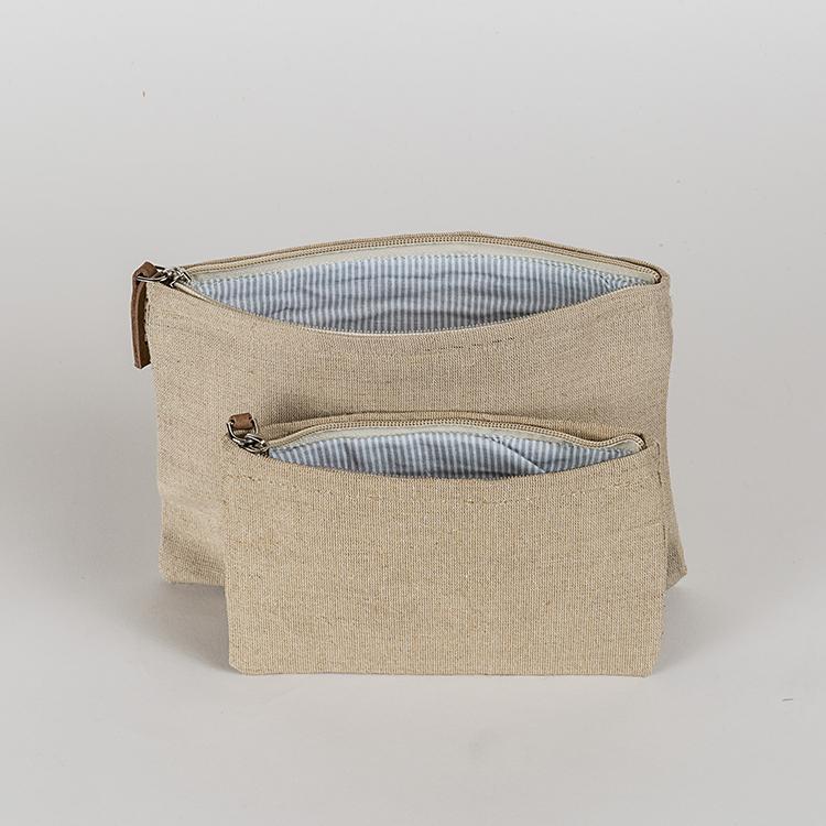 A set of two modern jute pouches with striped cotton lining and leather pulls, showcasing their elegant design and eco-friendly material.