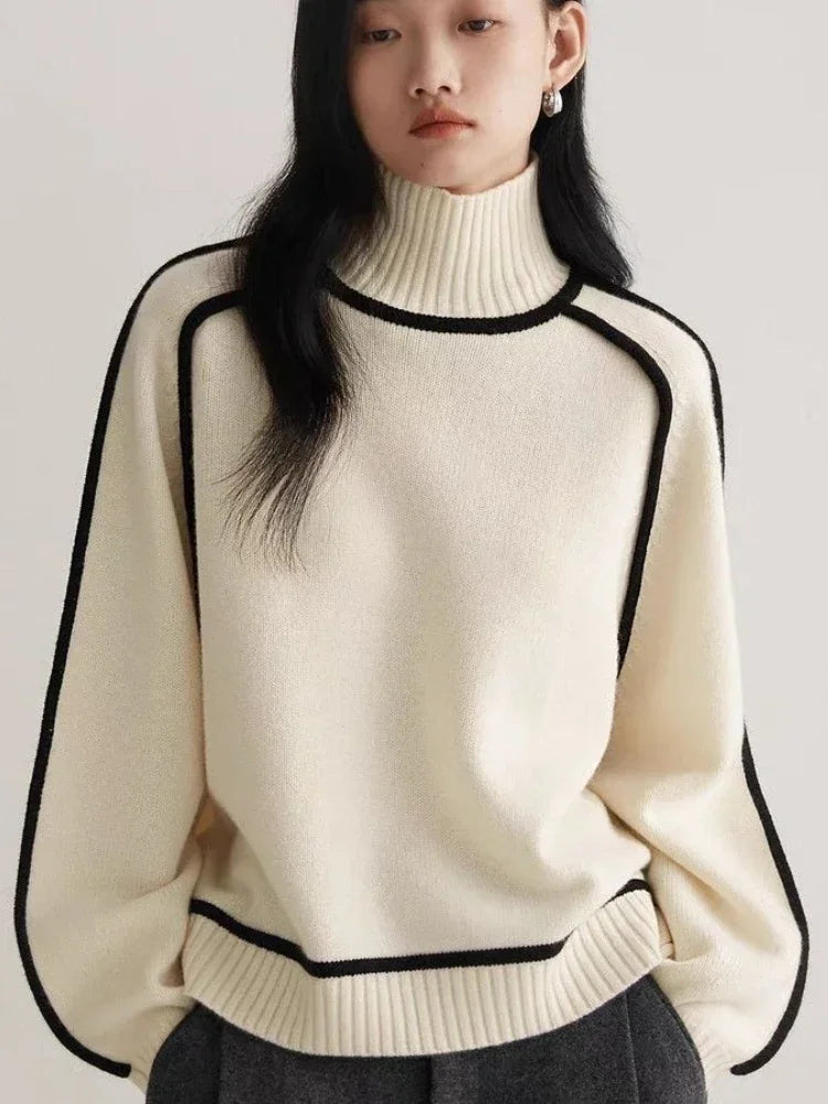 Modern Knit Sweater with Contrast Trim in white, gray, and brown colors, featuring a turtleneck and lantern sleeves.