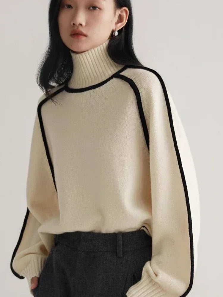 Modern Knit Sweater with Contrast Trim in white, gray, and brown colors, featuring a turtleneck and lantern sleeves.