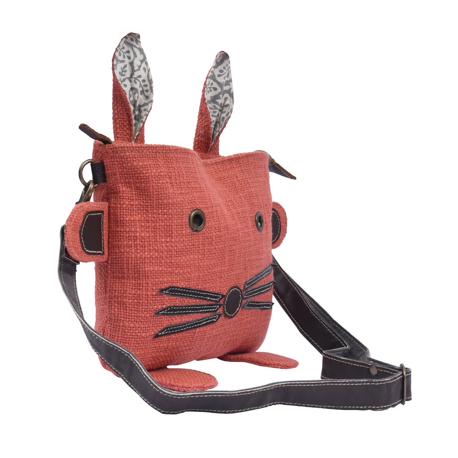 Mosi Crossbody bag made of cotton fabric, leather, and canvas, featuring a stylish design suitable for kids.