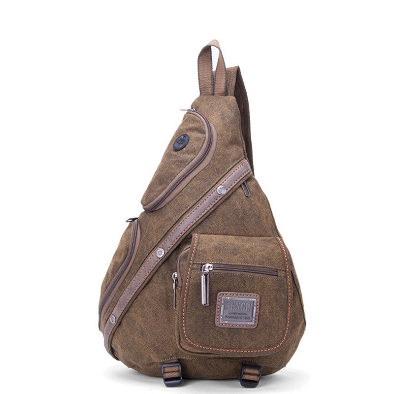 Multifunctional brown canvas chest bag with metal accents, showcasing its spacious design and durable material.