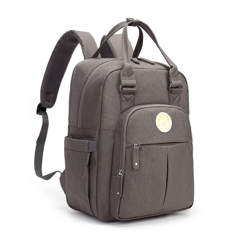 Multifunctional Large-Capacity Travel Mommy Bag in stylish design, showcasing its spacious interior and durable Oxford material.