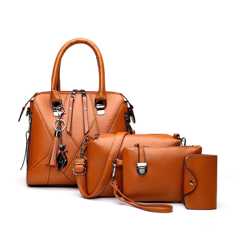 A stylish set of four women's bags in various sizes, showcasing elegant design and high-quality fabric, perfect for all occasions.