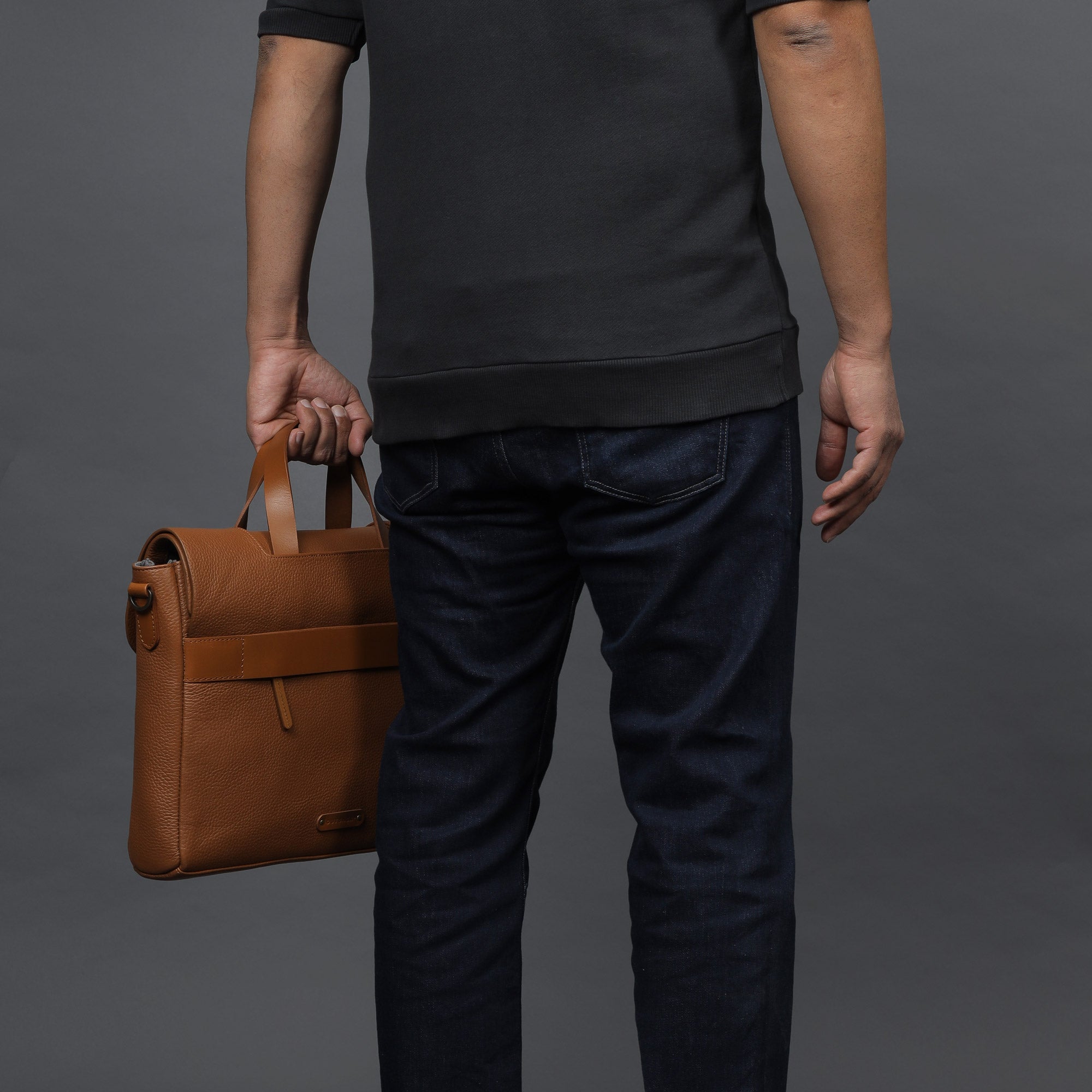 Muse Leather Briefcase showcasing premium full grain leather, spacious compartments, and elegant design.