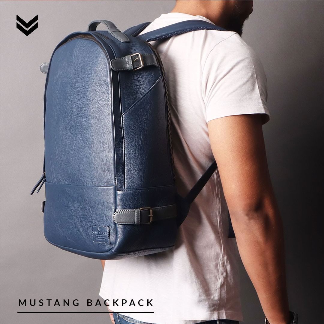 Mustang Leather Backpack showcasing premium full grain leather, multiple pockets, and adjustable straps.