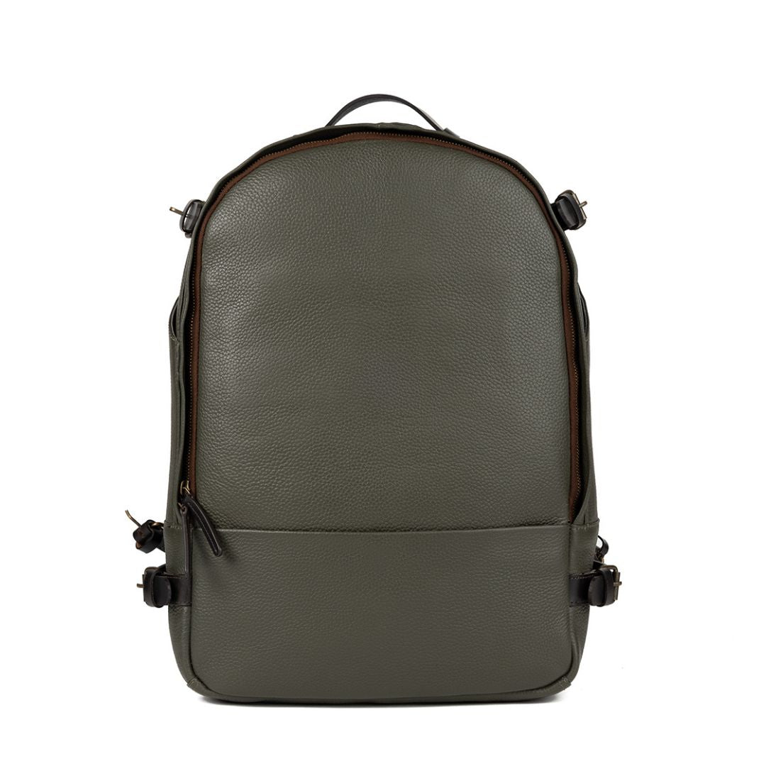 Mustang Leather Backpack showcasing premium full grain leather, multiple pockets, and adjustable straps, perfect for carrying laptops and essentials.