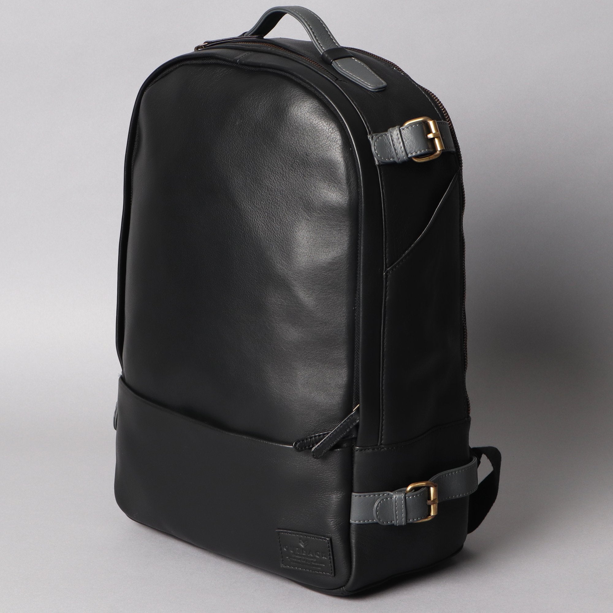 Mustang Leather Backpack made from premium full grain leather, featuring multiple pockets and adjustable straps, perfect for carrying laptops and essentials.