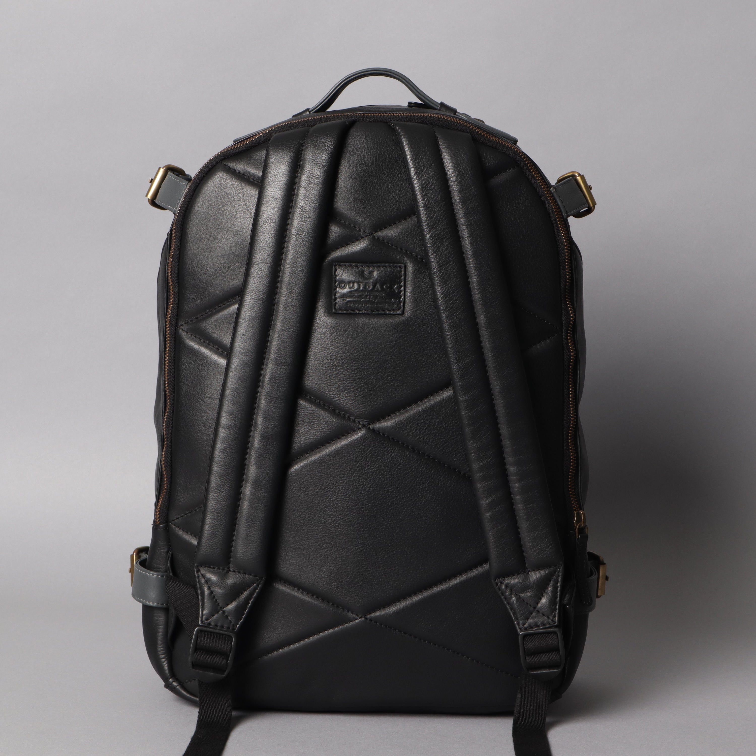 Mustang Leather Backpack made from premium full grain leather, featuring multiple pockets and adjustable straps, perfect for carrying laptops and essentials.