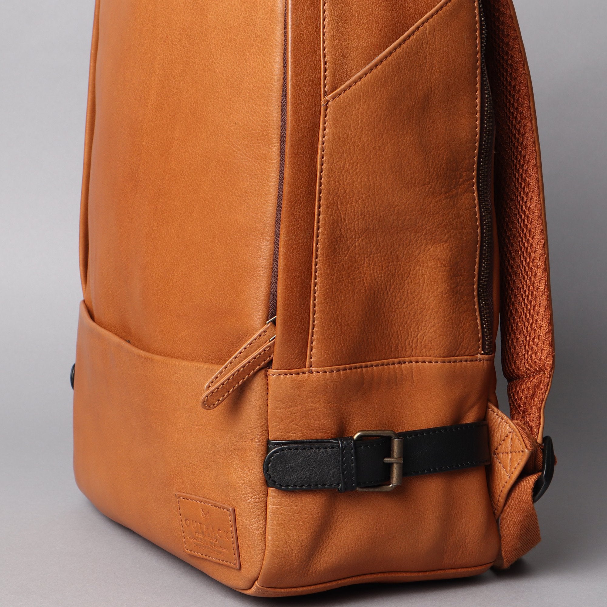 Mustang Leather Backpack showcasing premium full-grain leather, multiple pockets, and adjustable straps.