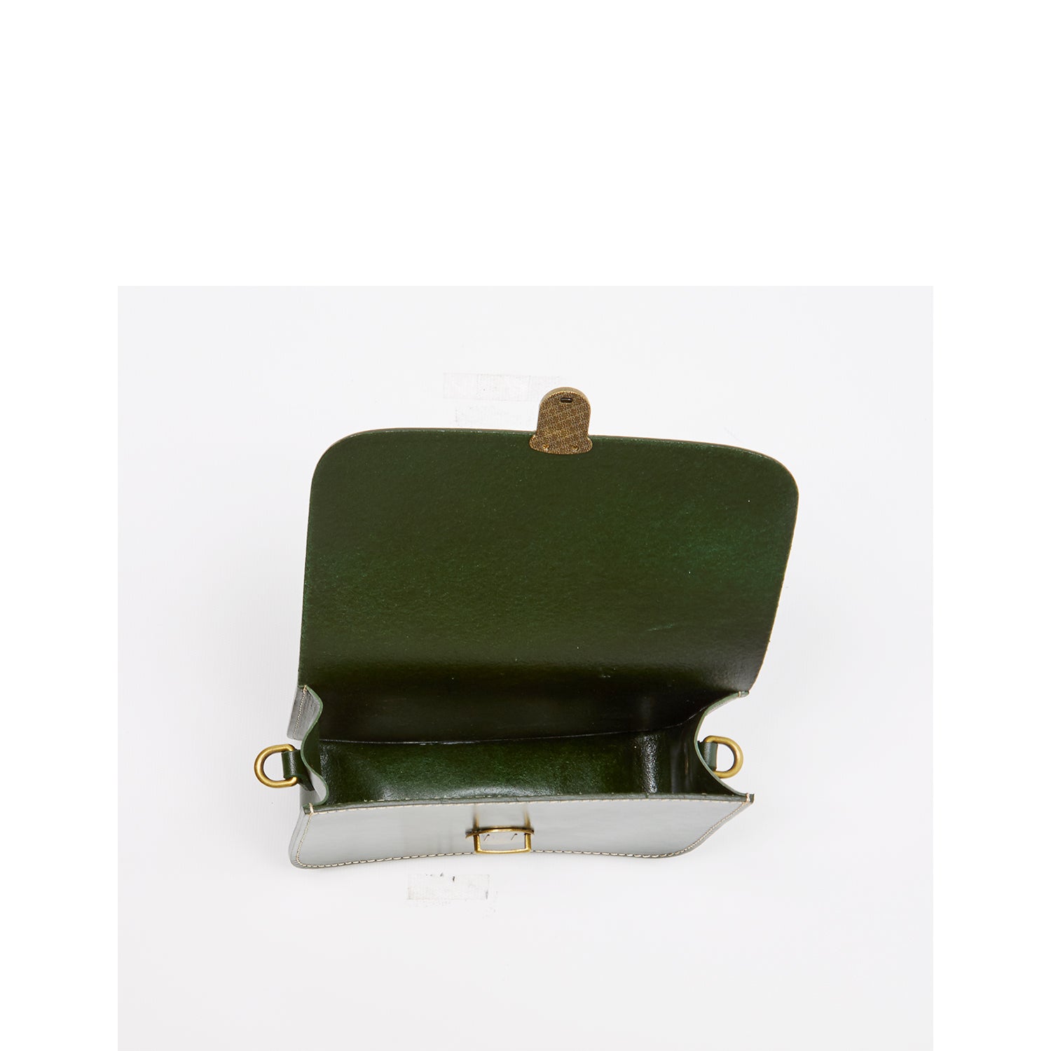 Nanah Dark Green Leather Crossbody Bag with bronze hardware and adjustable strap, showcasing a vintage camera bag design.