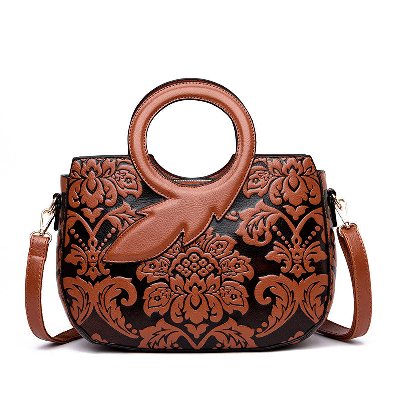 National Style One Shoulder Soft Leather Bag in oval shape, showcasing its stylish design and large capacity.