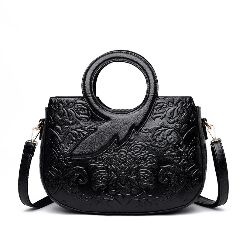 National Style One Shoulder Soft Leather Bag in oval shape, showcasing its stylish design and large capacity.