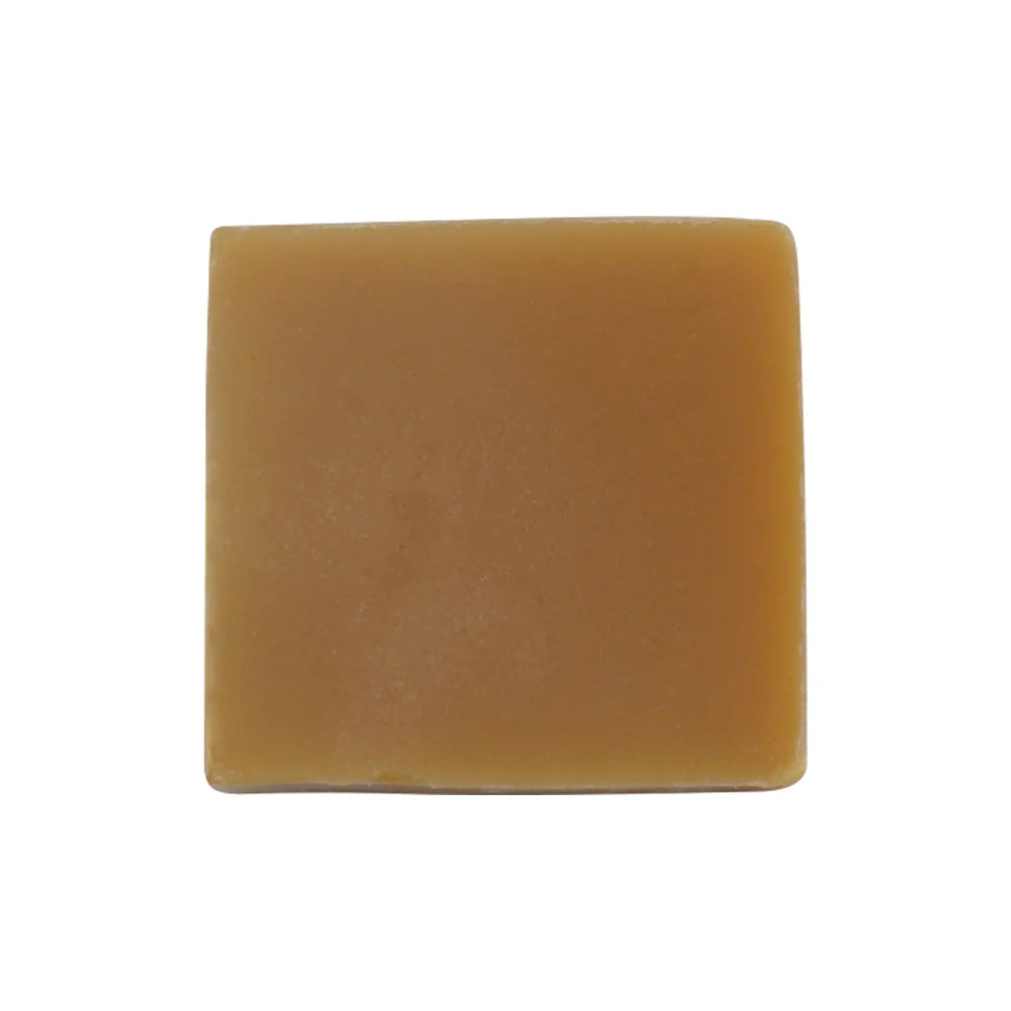 Natural Fresh Turmeric Soap with turmeric and goat milk, showcasing its vibrant color and texture.