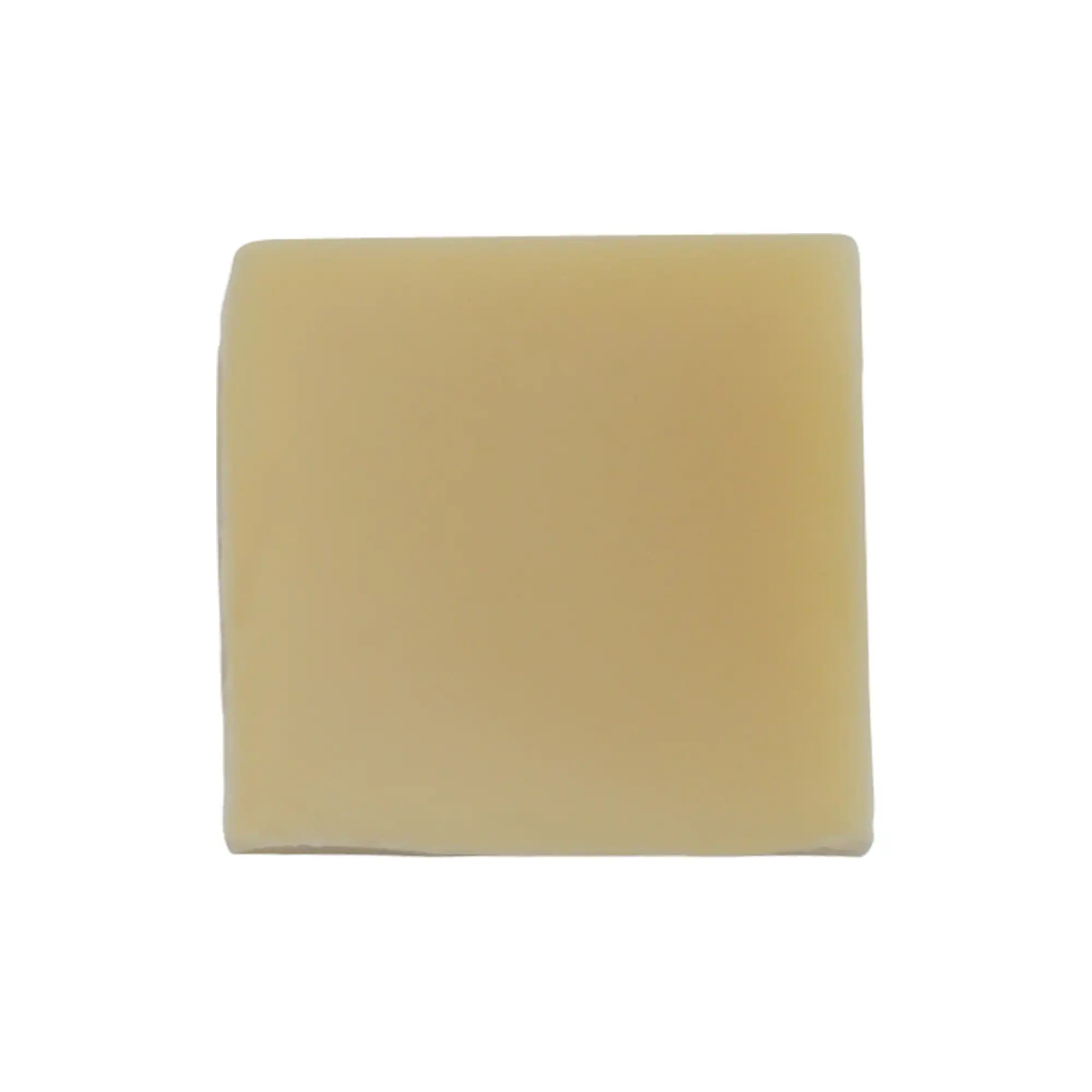 Natural Organic Coconutty Soap bar with coconut and shea butter ingredients, showcasing its creamy texture and luxurious appeal.