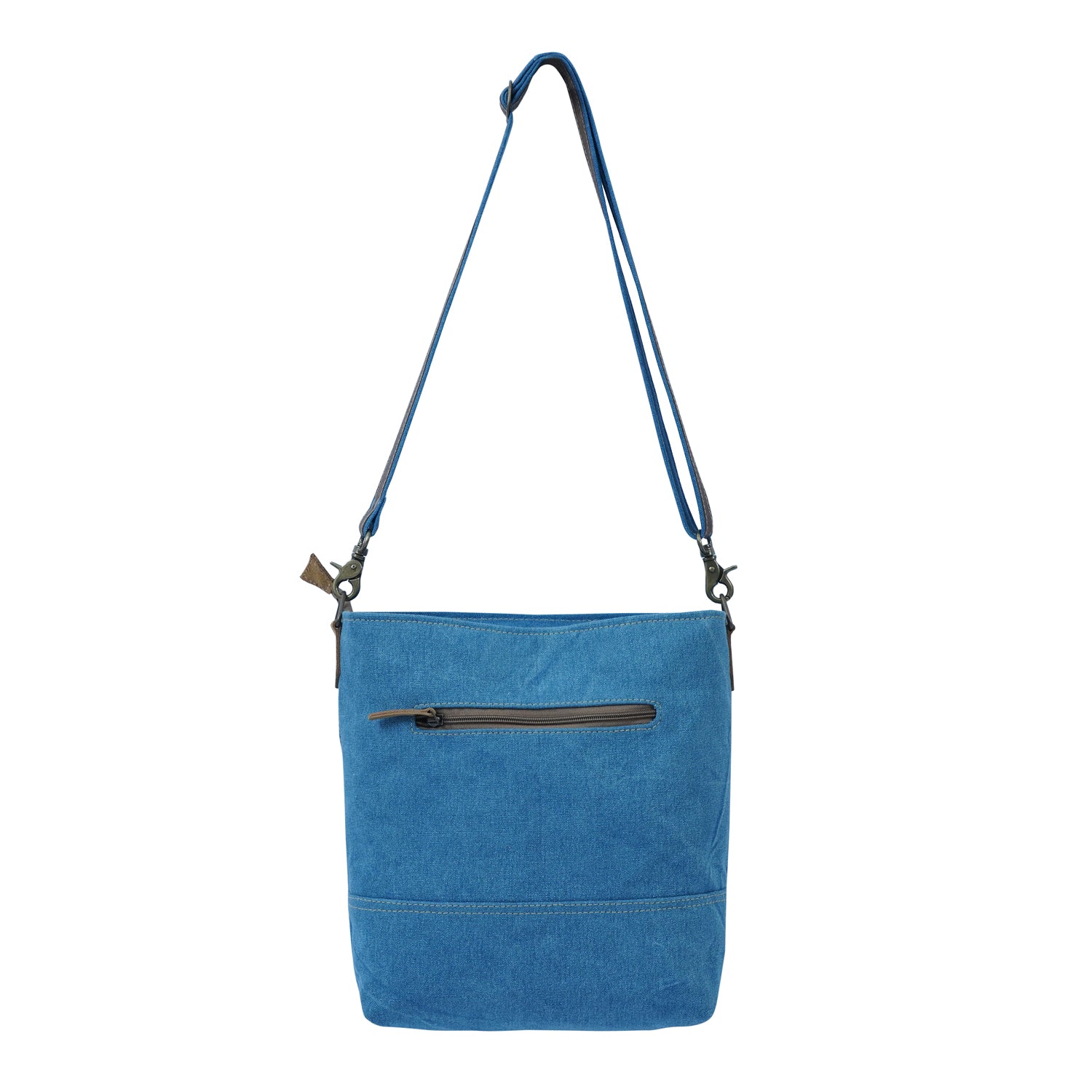 Niro Shoulder Bag made of denim and canvas, featuring an adjustable strap and spacious interior, perfect for various occasions.