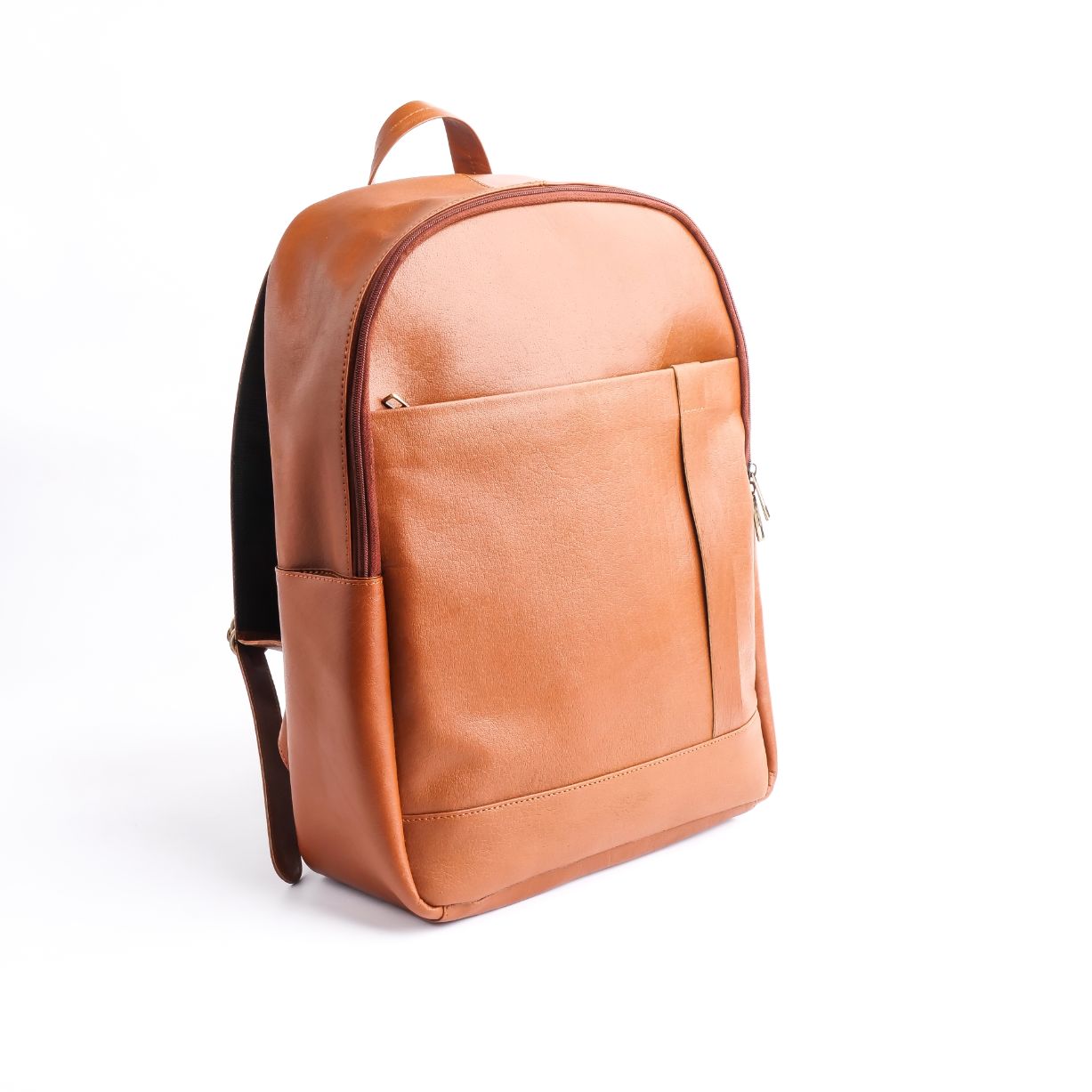 Tan brown On-The-Go Leather Backpack showcasing its sleek design and multiple compartments.