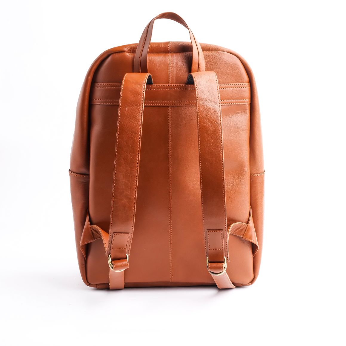 Tan brown On-The-Go Leather Backpack showcasing its sleek design and multiple compartments.