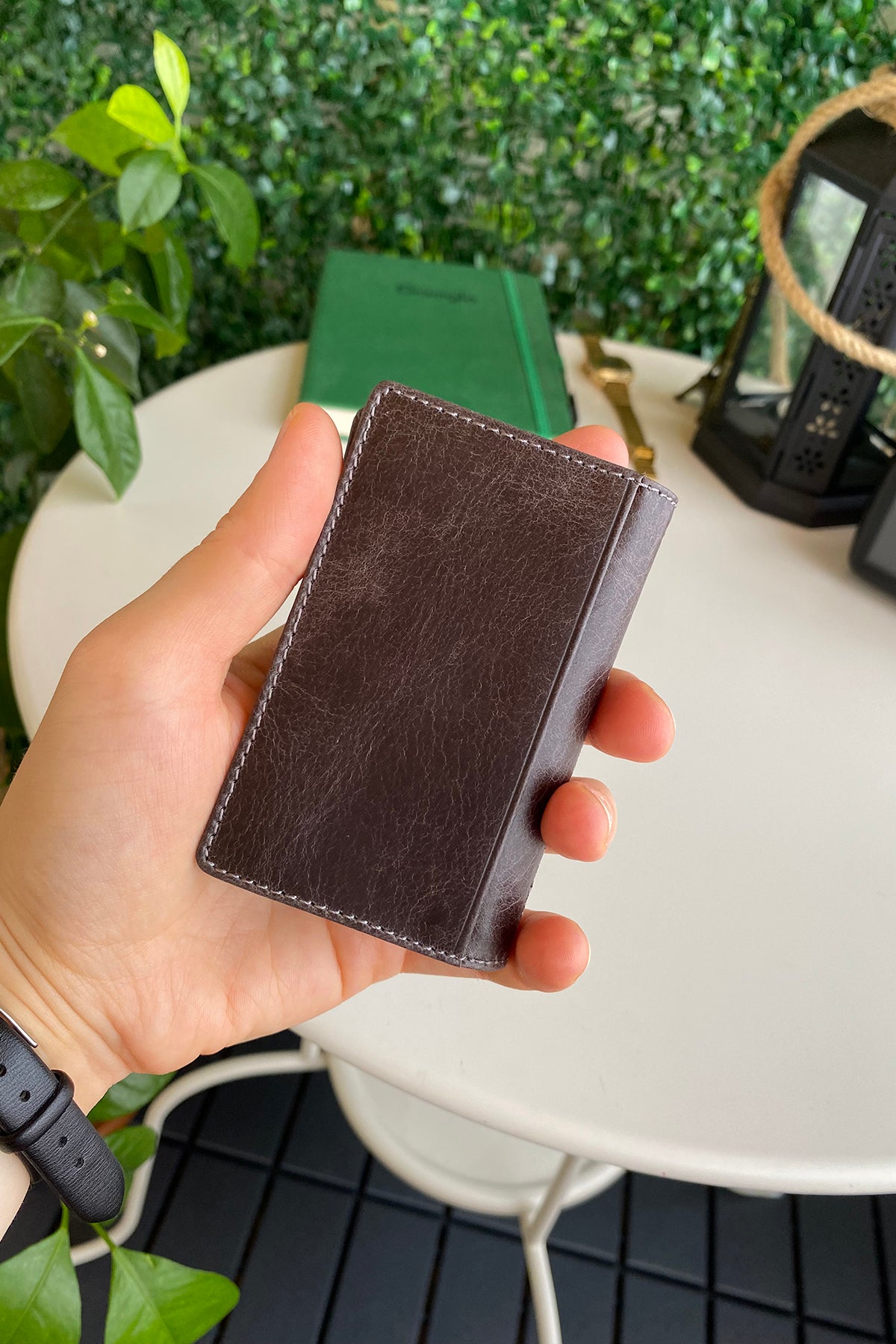 Orsa Genuine Leather Premium Credit Card Holder in various colors, showcasing its sleek design and card slots.