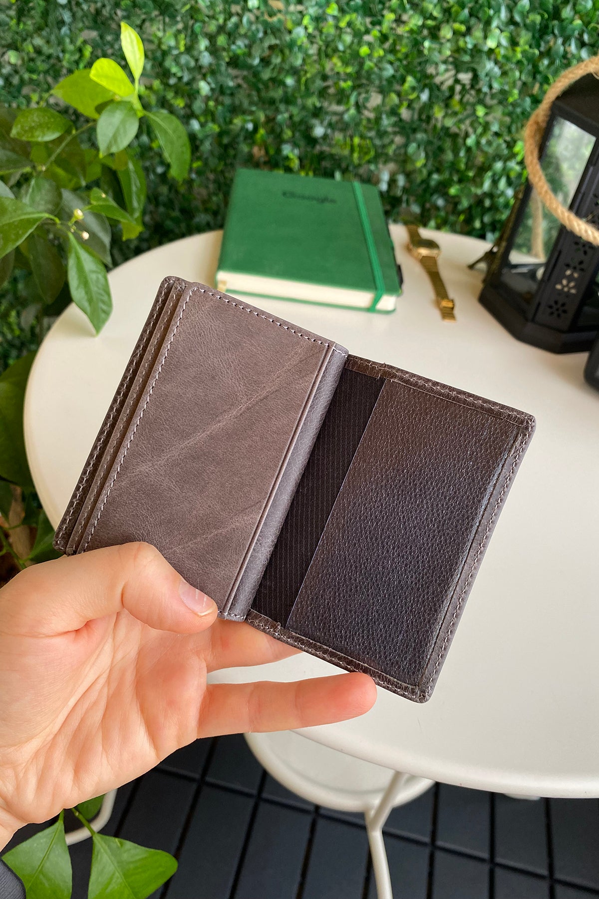 Orsa Genuine Leather Premium Credit Card Holder in various colors, showcasing its sleek design and card slots.