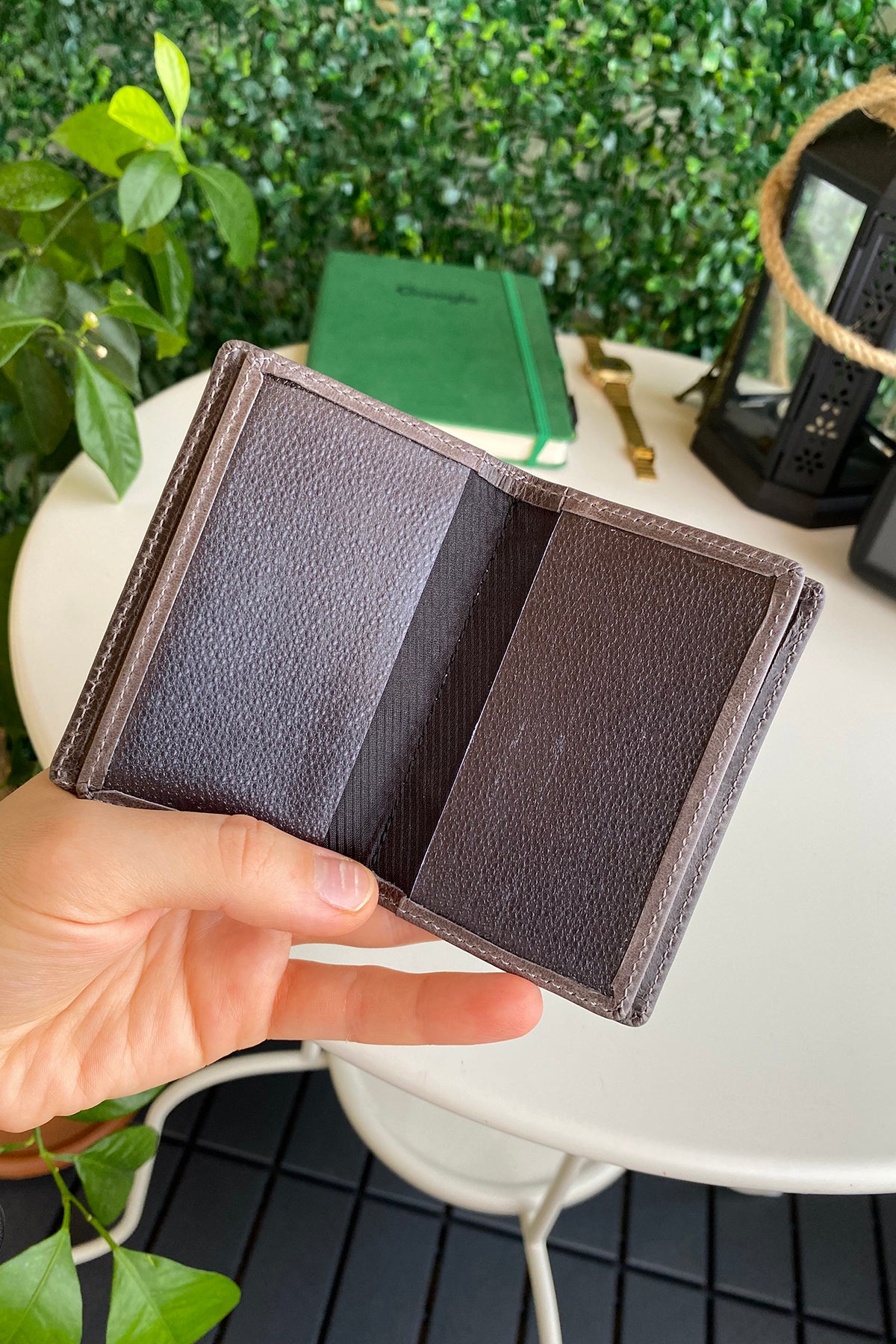 Orsa Genuine Leather Premium Credit Card Holder in various colors, showcasing its sleek design and card slots.