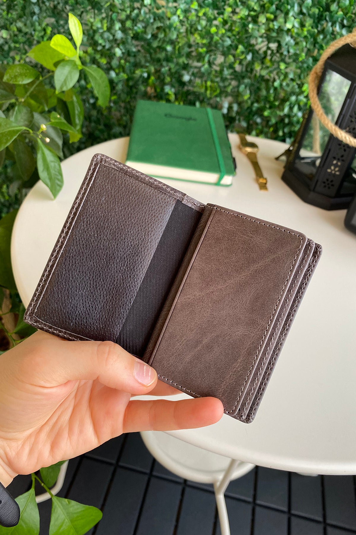 Orsa Genuine Leather Premium Credit Card Holder in various colors, showcasing its sleek design and card slots.