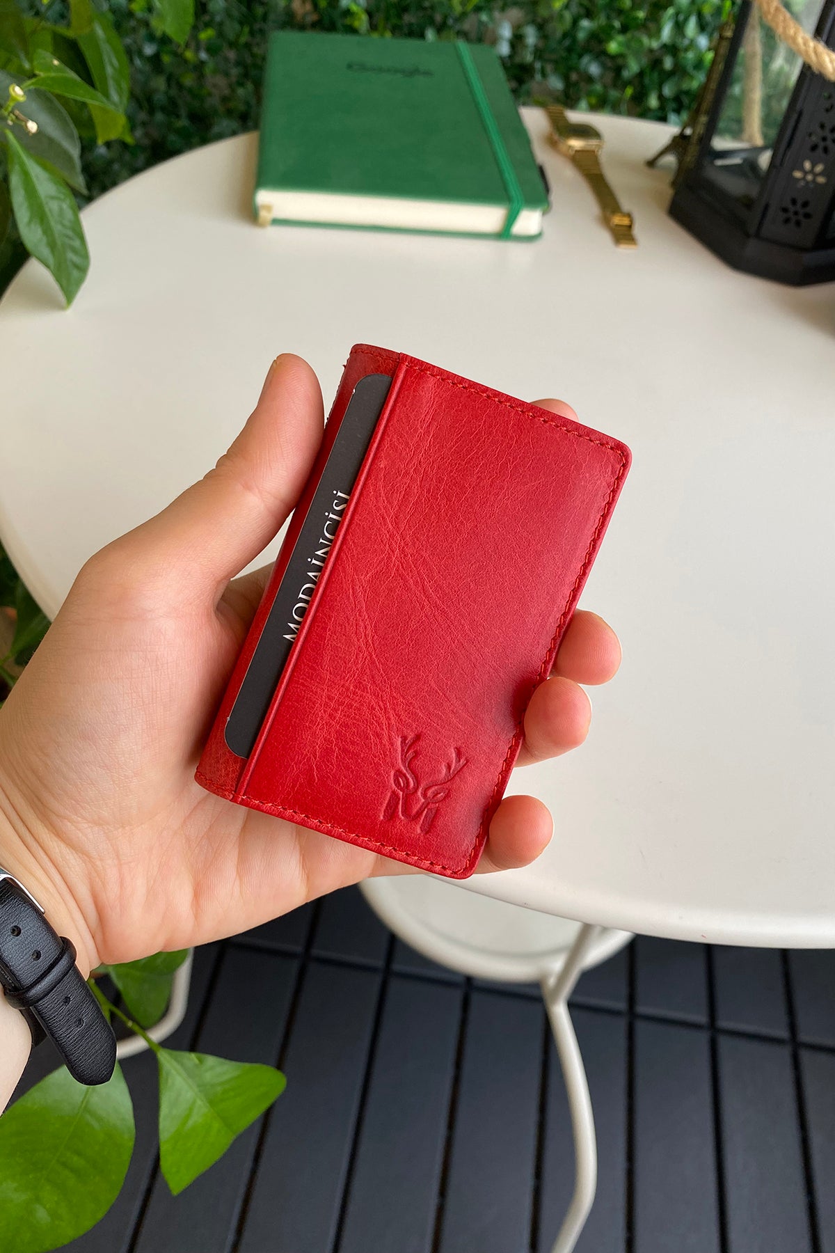 Orsa Genuine Leather Premium Credit Card Holder in various colors, showcasing its sleek design and card slots.