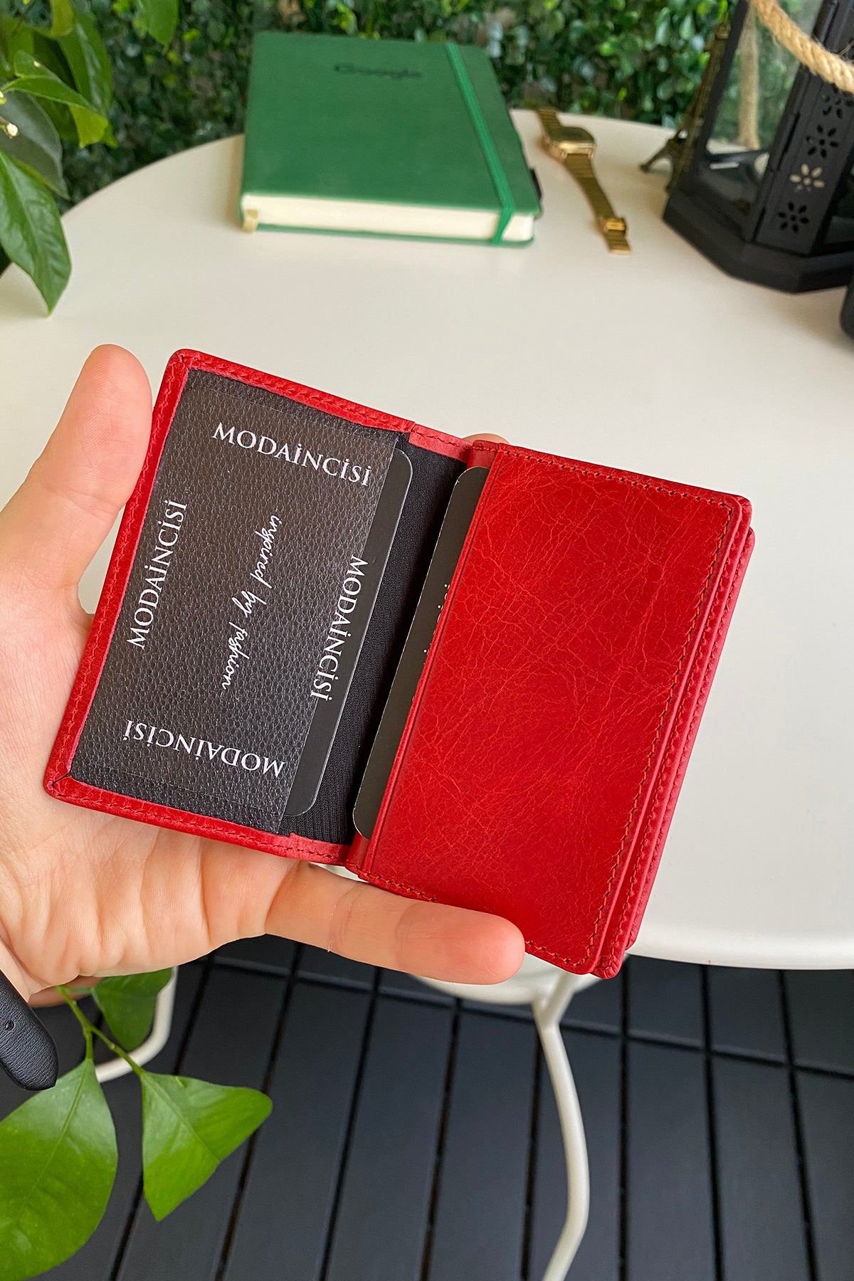 Orsa Genuine Leather Premium Credit Card Holder in various colors, showcasing its sleek design and card slots.