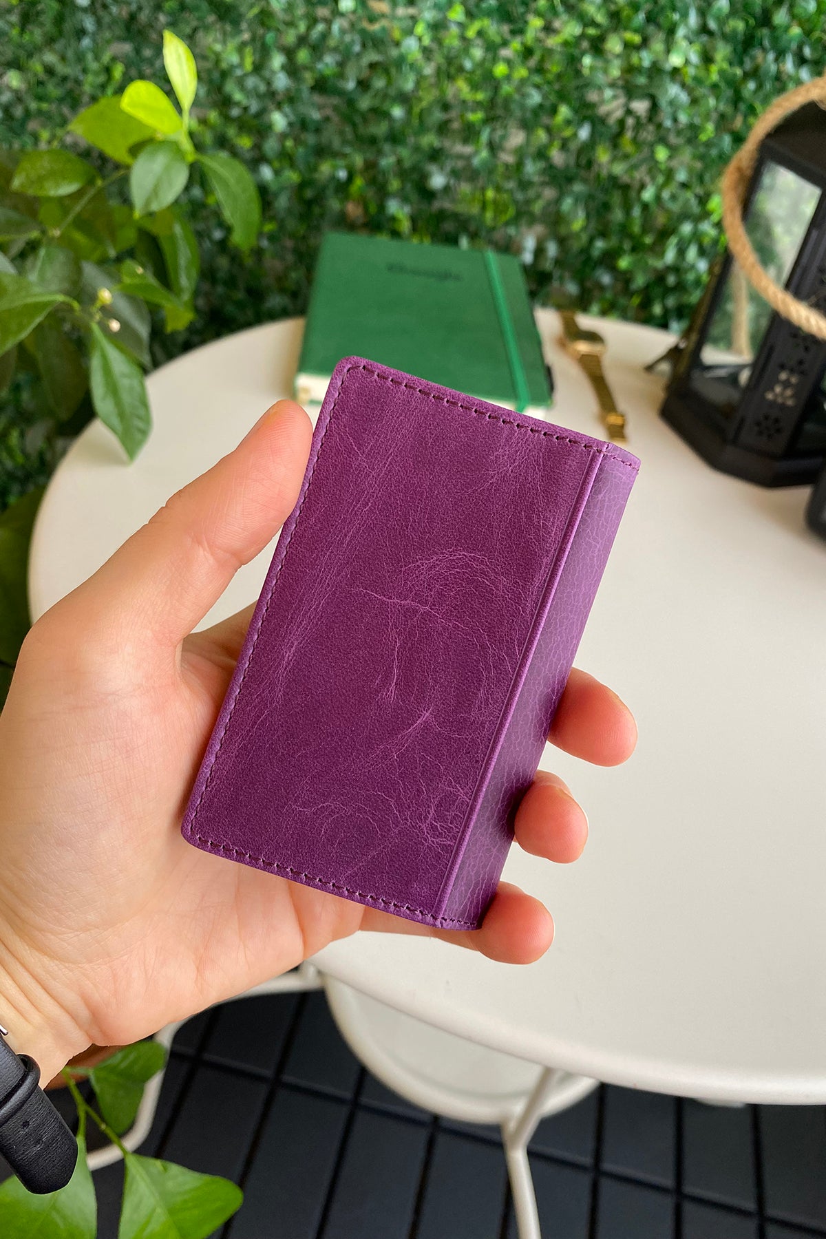 Orsa Genuine Leather Premium Credit Card Holder in various colors, showcasing its sleek design and card slots.