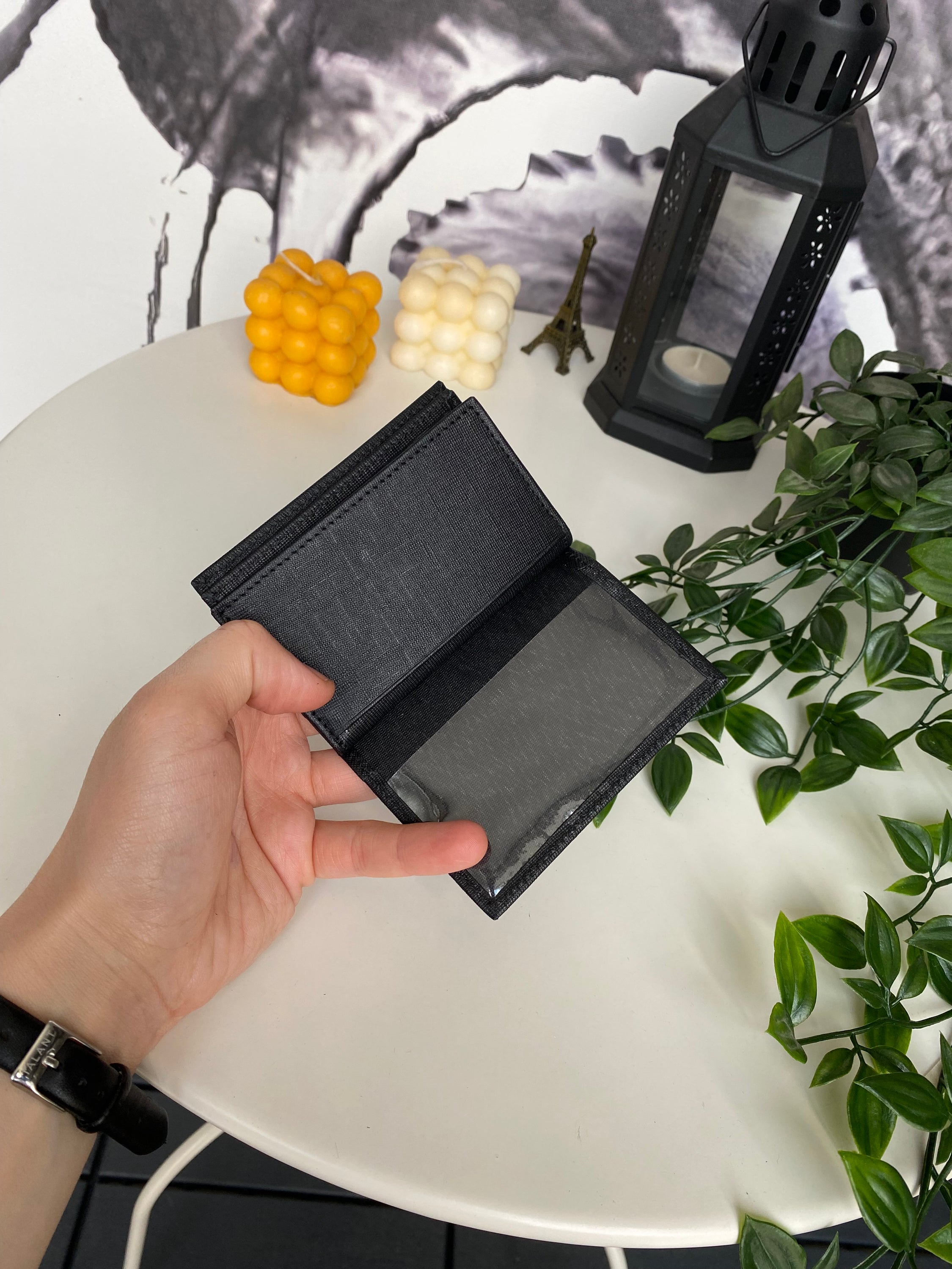 Orsa Genuine Leather Premium Credit Card Holder in various colors, showcasing its sleek design and card slots.