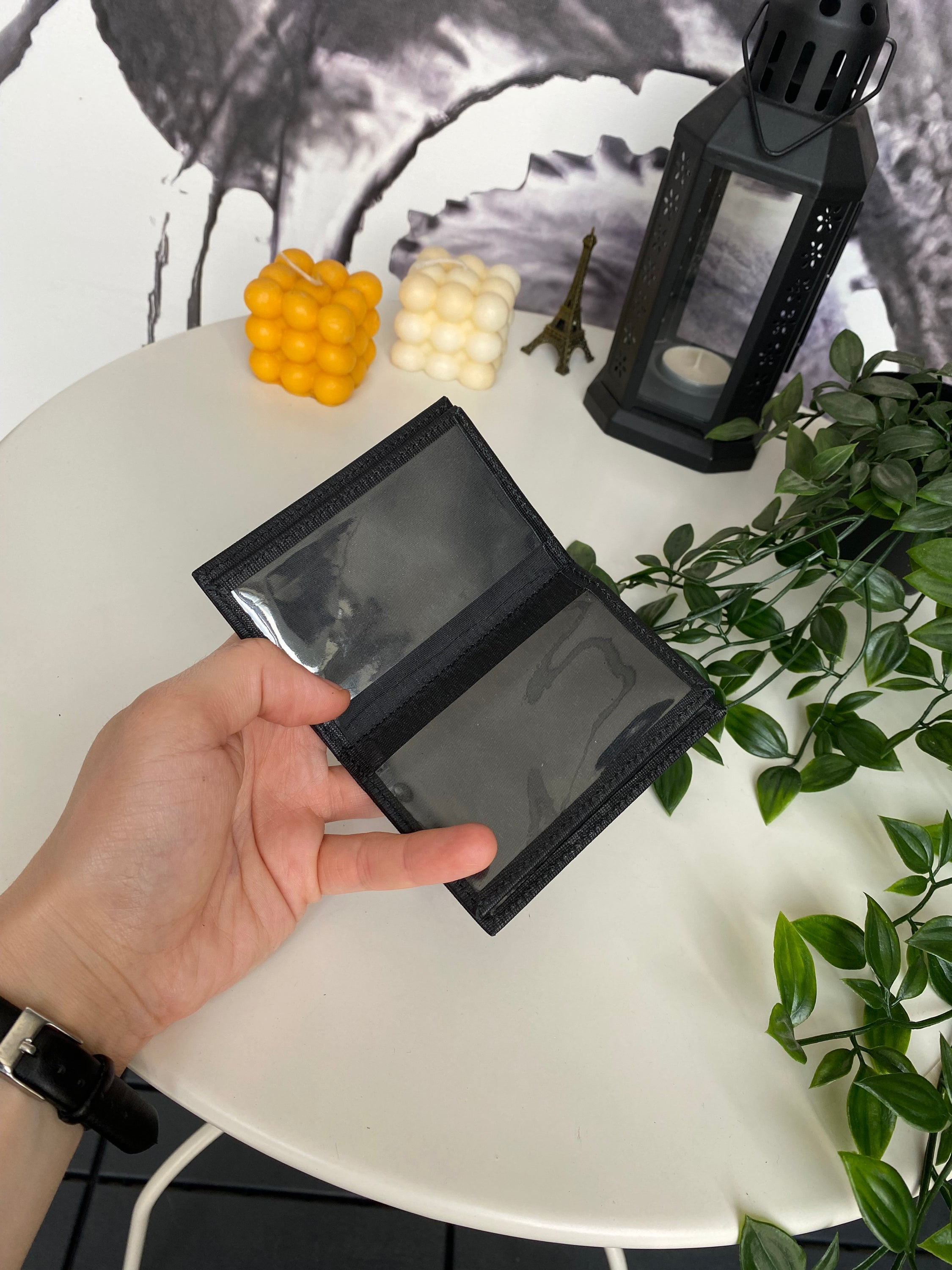 Orsa Genuine Leather Premium Credit Card Holder in various colors, showcasing its sleek design and card slots.