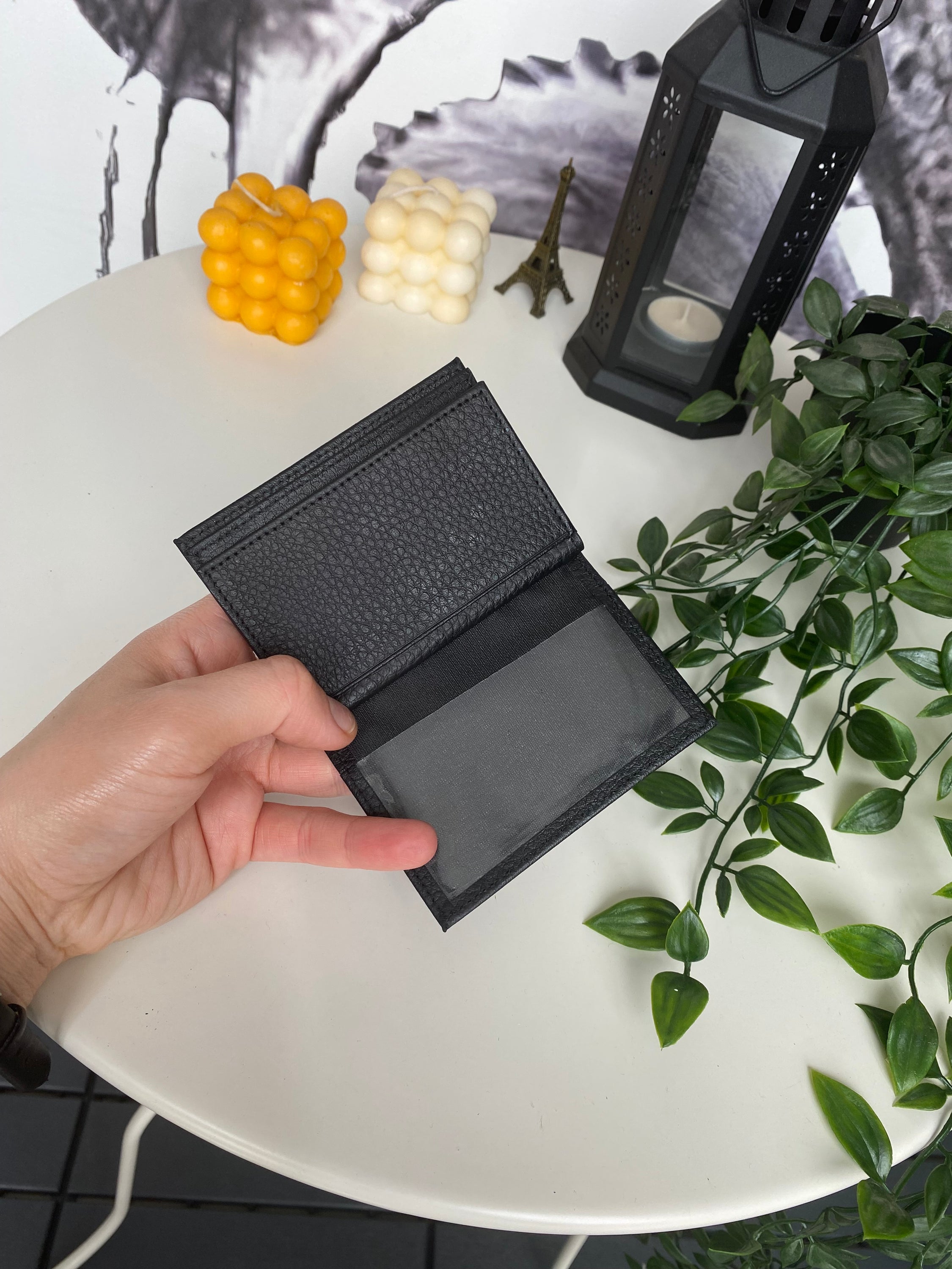 Orsa Genuine Leather Premium Credit Card Holder in various colors, showcasing its sleek design and card slots.