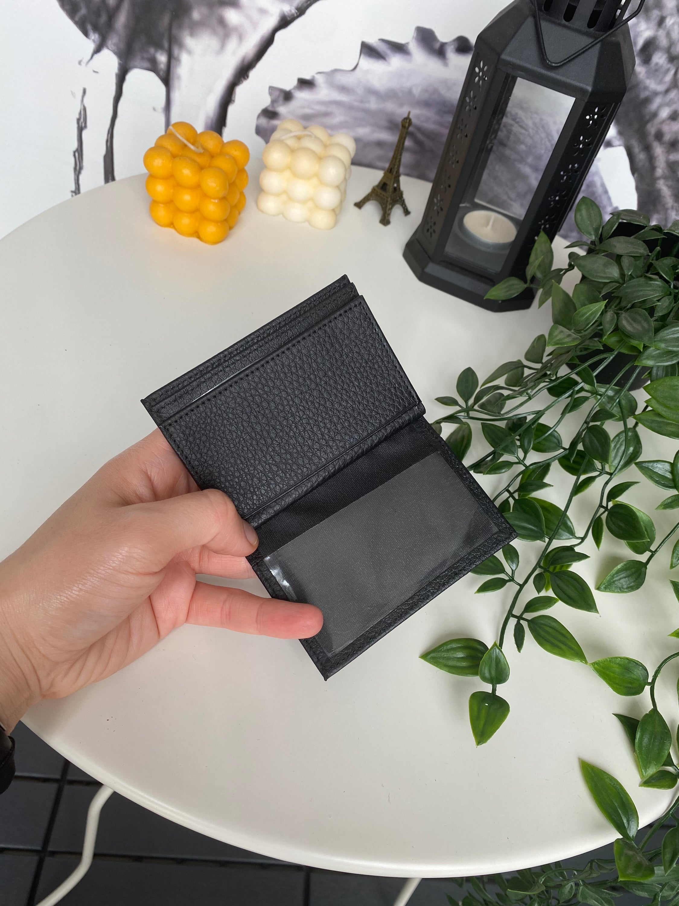 Orsa Genuine Leather Premium Credit Card Holder in various colors, showcasing its sleek design and card slots.