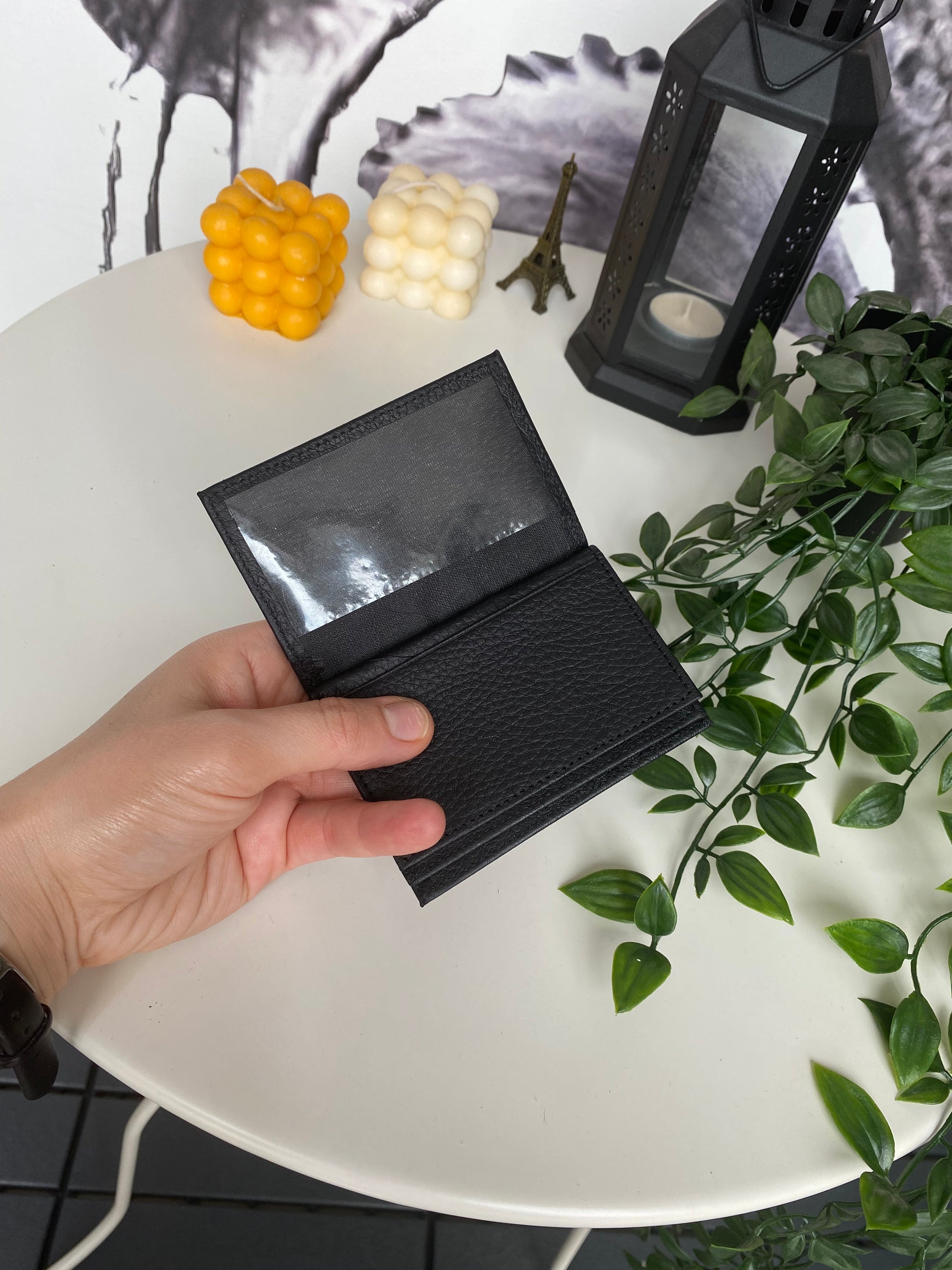 Orsa Genuine Leather Premium Credit Card Holder in various colors, showcasing its sleek design and card slots.