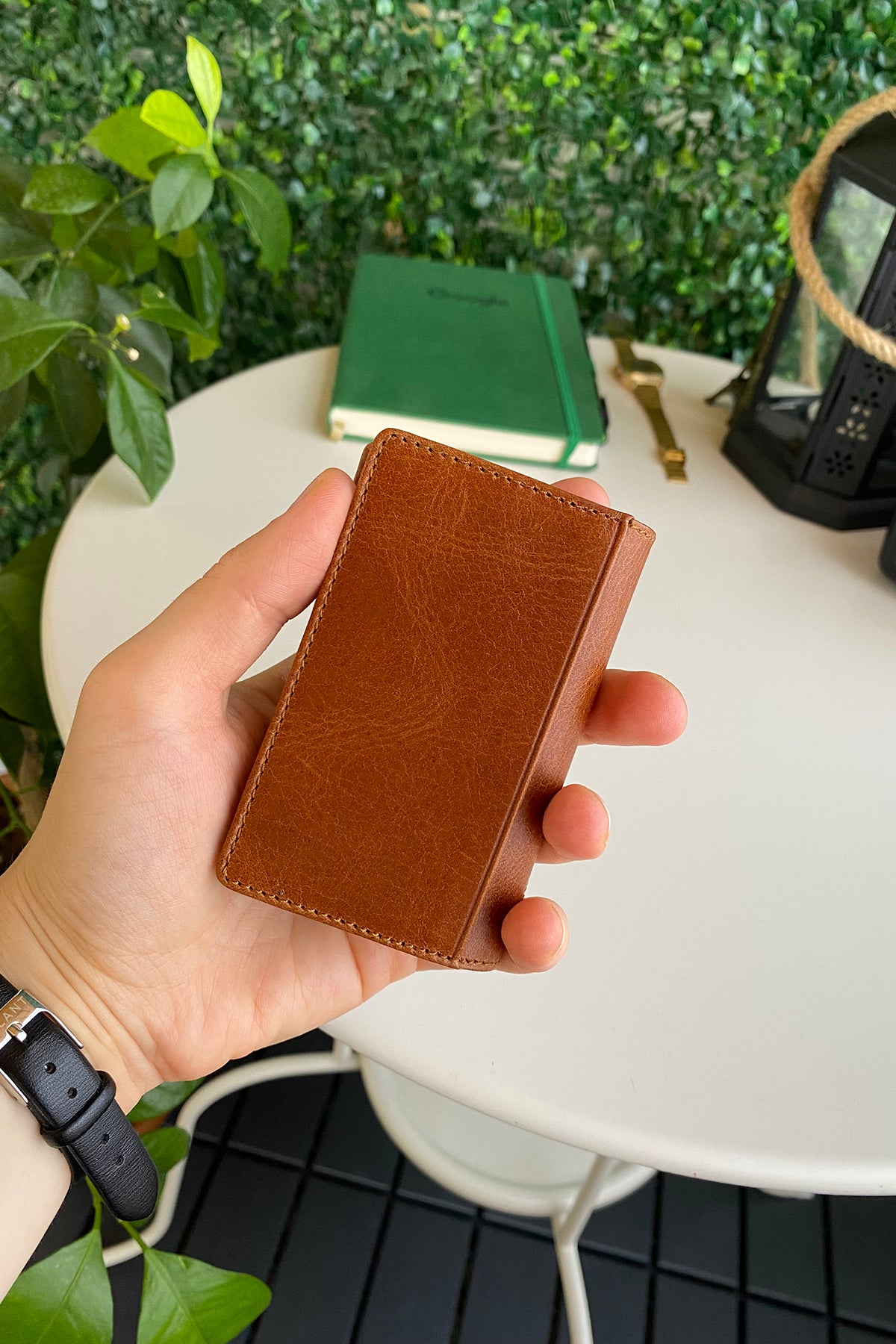 Orsa Genuine Leather Premium Credit Card Holder in various colors, showcasing its sleek design and card slots.