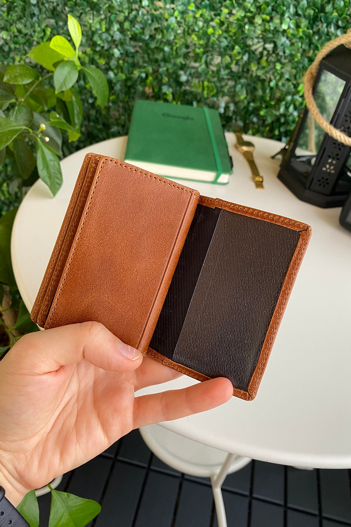 Orsa Genuine Leather Premium Credit Card Holder in various colors, showcasing its sleek design and card slots.