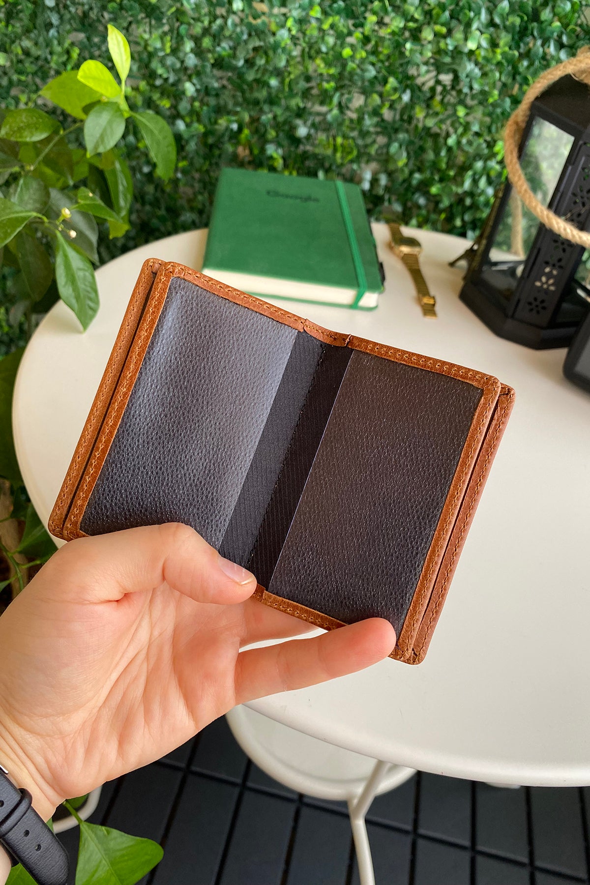 Orsa Genuine Leather Premium Credit Card Holder in various colors, showcasing its sleek design and card slots.