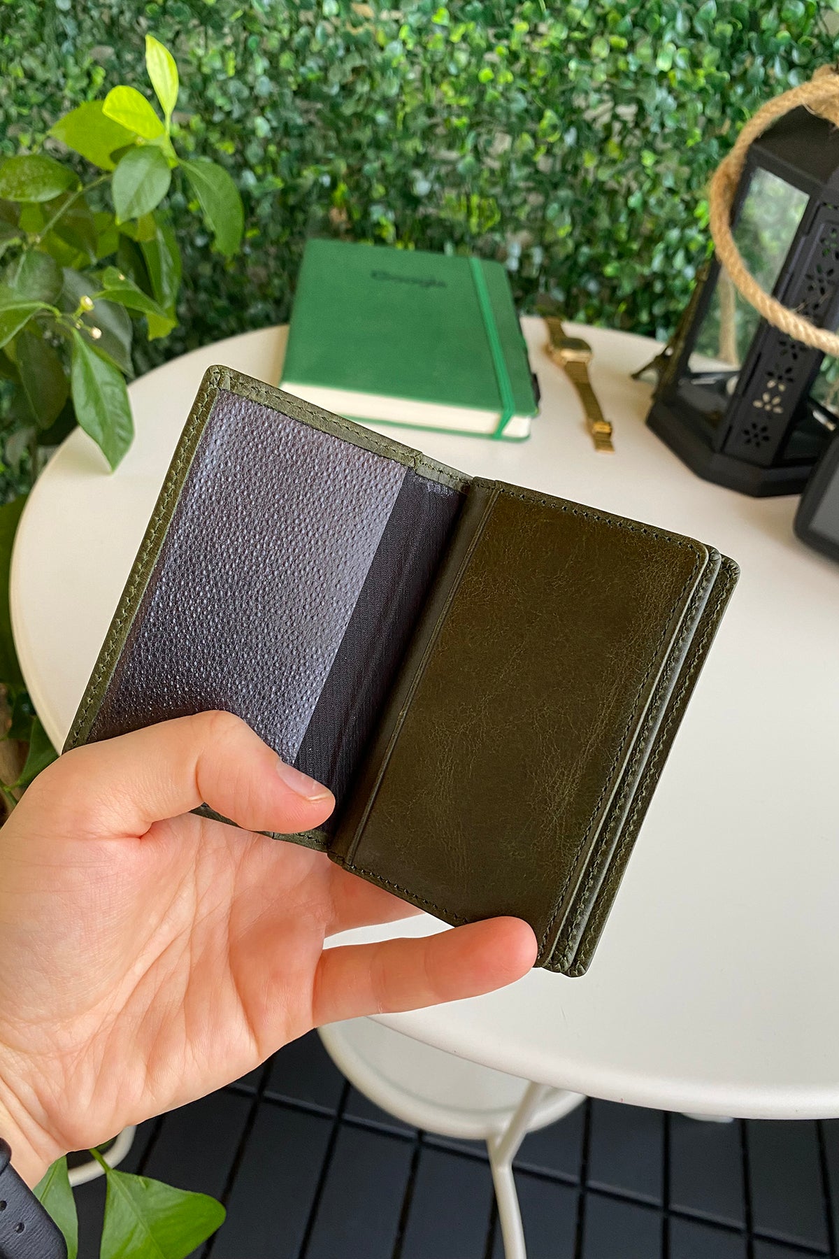 Orsa Genuine Leather Premium Credit Card Holder in various colors, showcasing its sleek design and card slots.