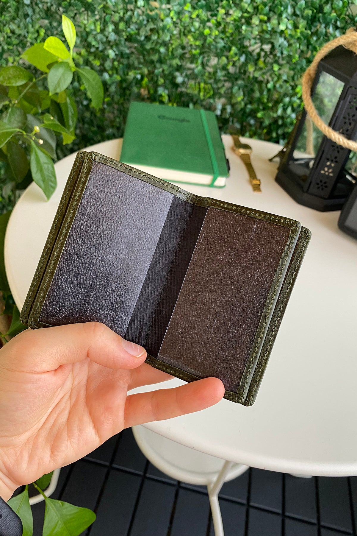 Orsa Genuine Leather Premium Credit Card Holder in various colors, showcasing its sleek design and card slots.