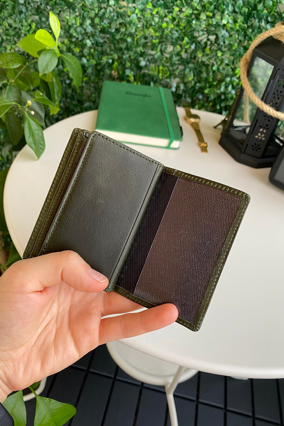 Orsa Genuine Leather Premium Credit Card Holder in various colors, showcasing its sleek design and card slots.